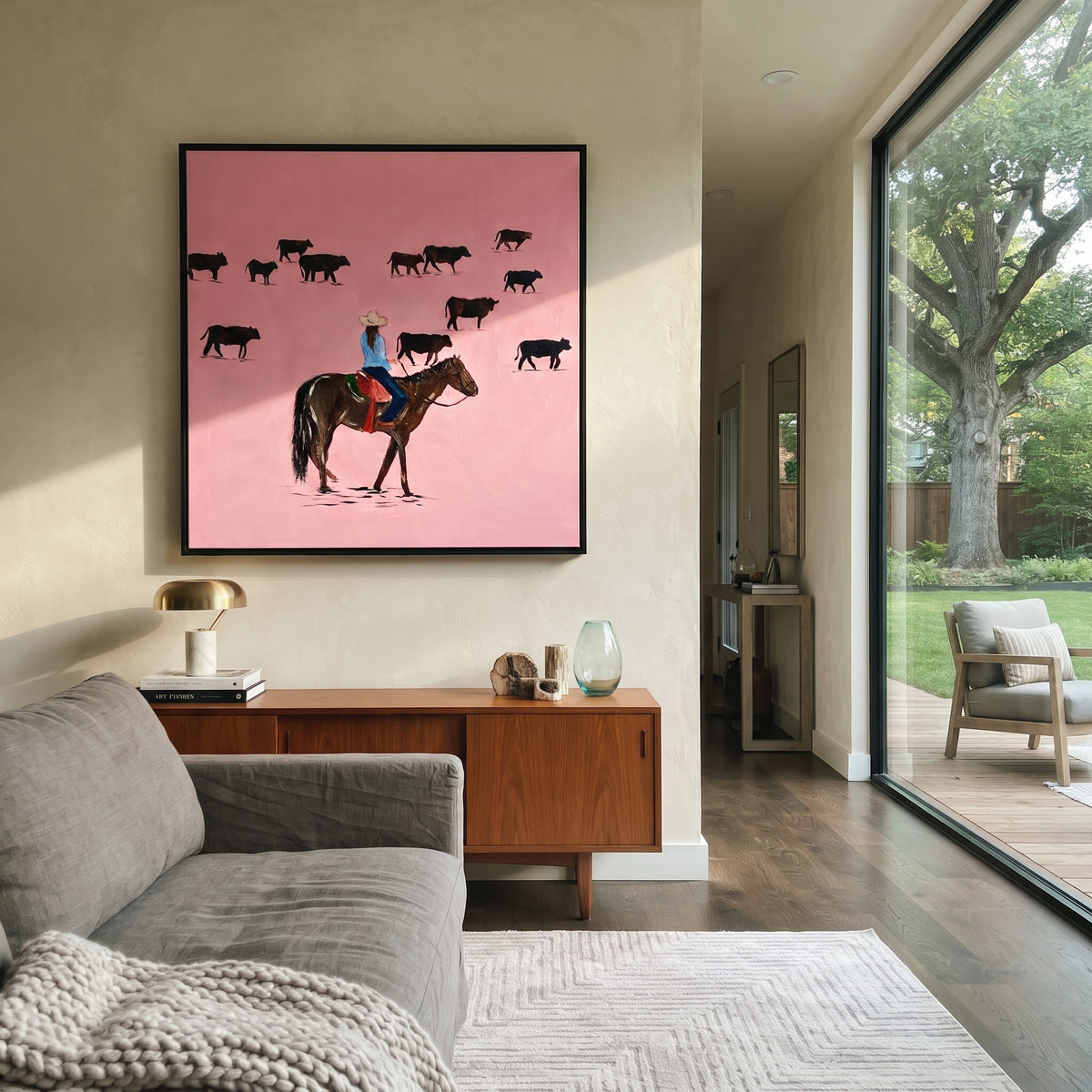Pink Range Roundup - cowboy herding cattle painting shown in modern room setting 2