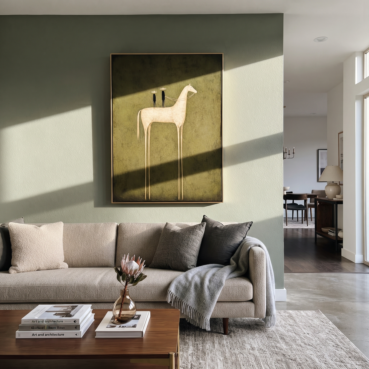 Two Figures Ride Ivory displayed in a layered residential setting