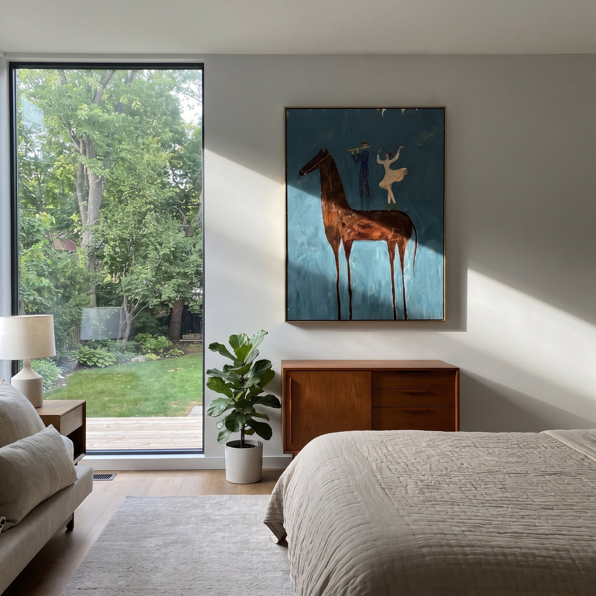 Small Dancers Ride Brown - brown horse performers painting by Laura Chen, modern Western vertical wall art - displayed beside a reading chair