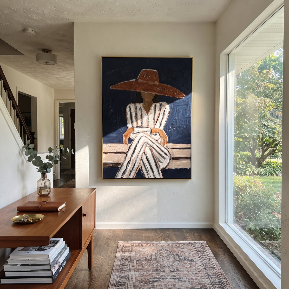 Rust Brim Guards Stillness – seated striped sombrero woman, Retro Modern vertical wall art - displayed along a stair landing