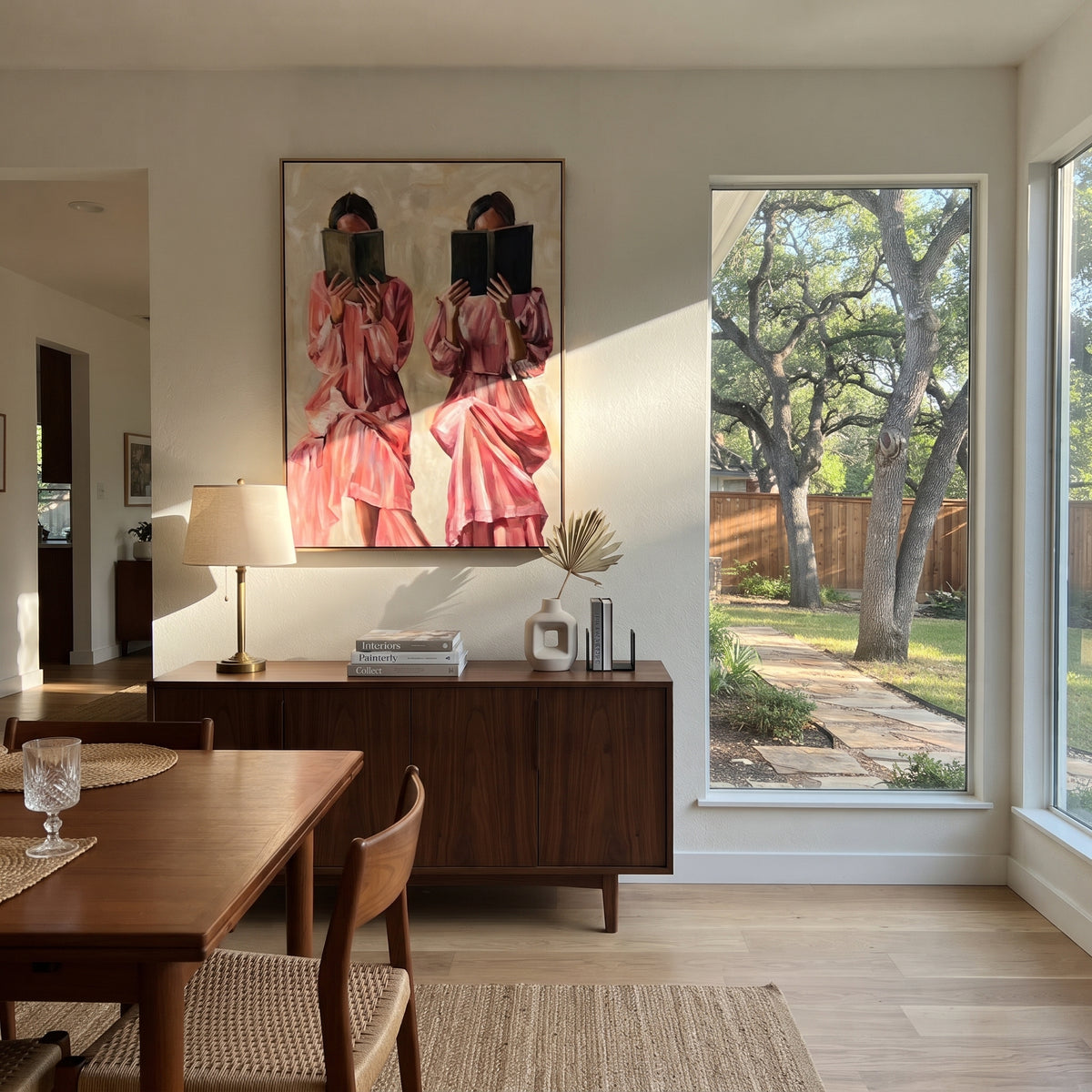Twin Readers in Rose - two women reading painting shown in modern room setting 4
