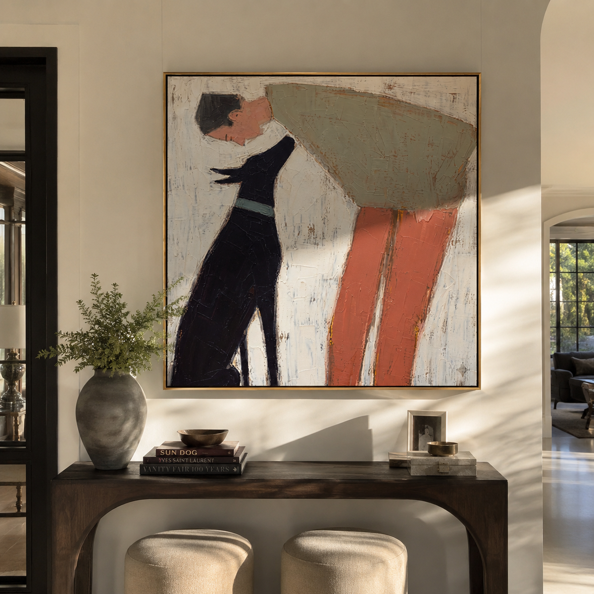 Soft Giant Leans Close person embracing large dog painting displayed in a styled interior