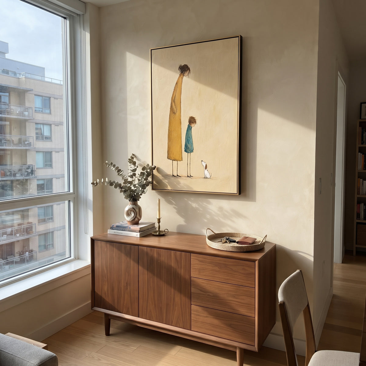 Tall Coat Small Wonders woman child and rabbit painting displayed in a styled interior