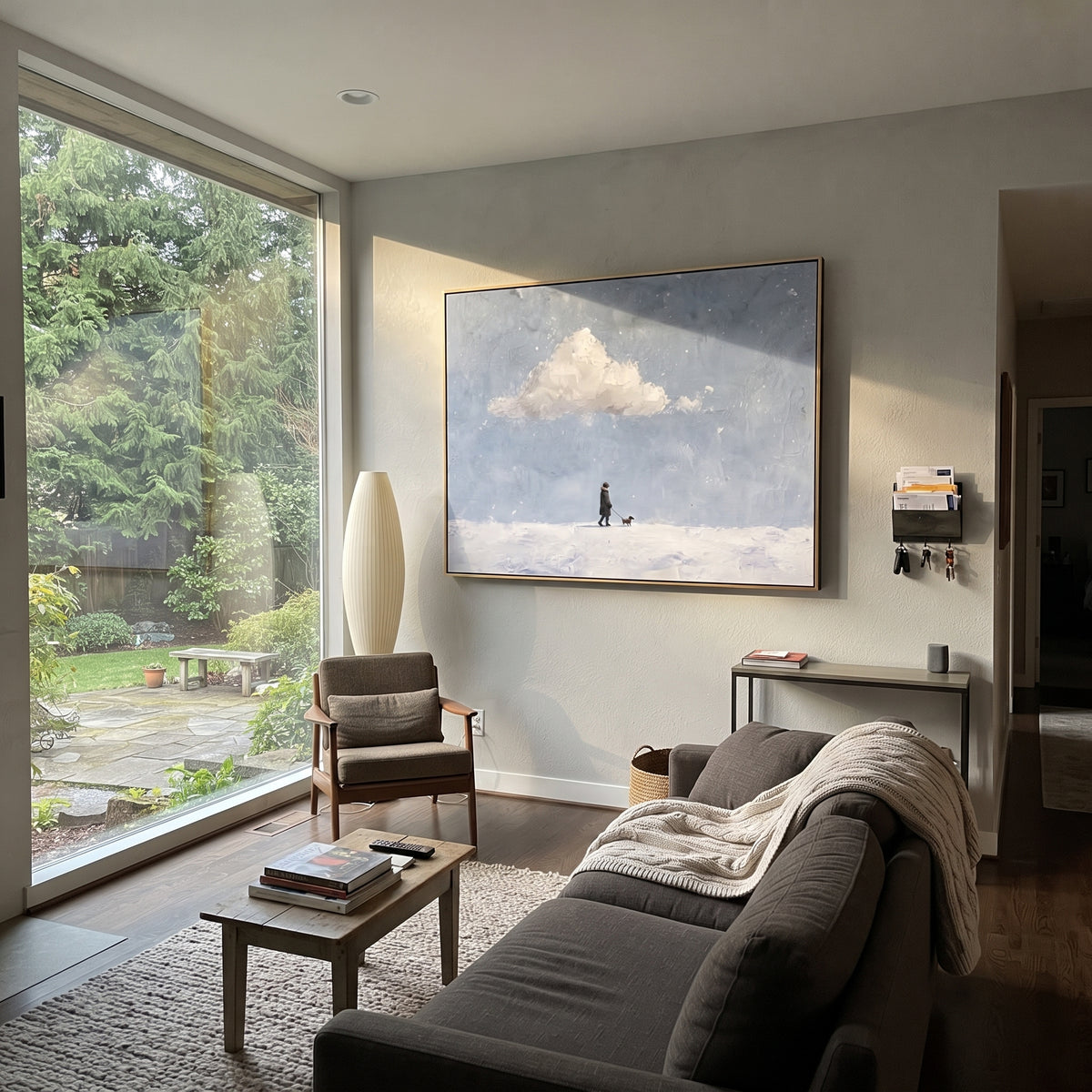 Small Steps Across Snow people and pets wall art in a contemporary room