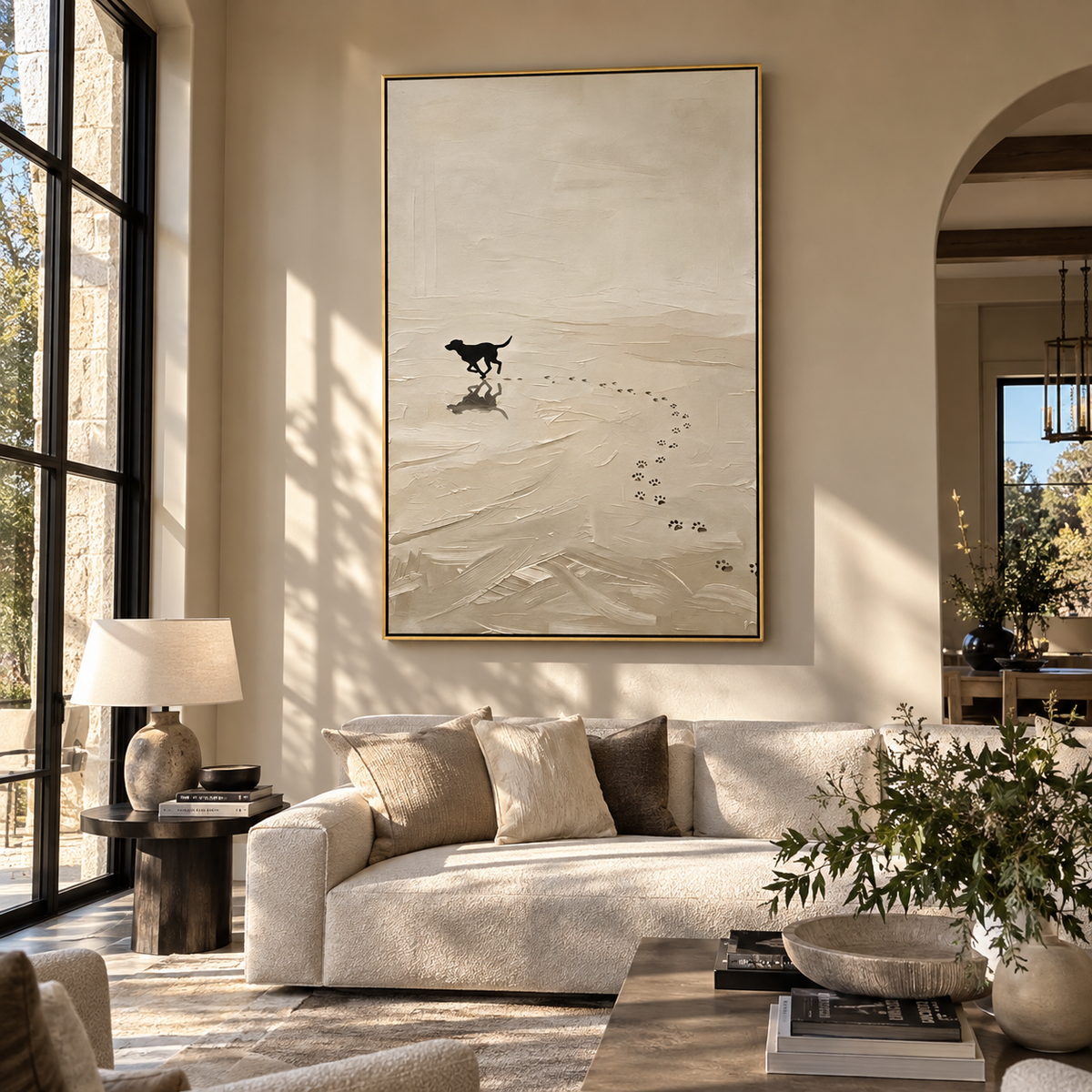 Black Dog Finds Snow painting displayed above modern furnishings