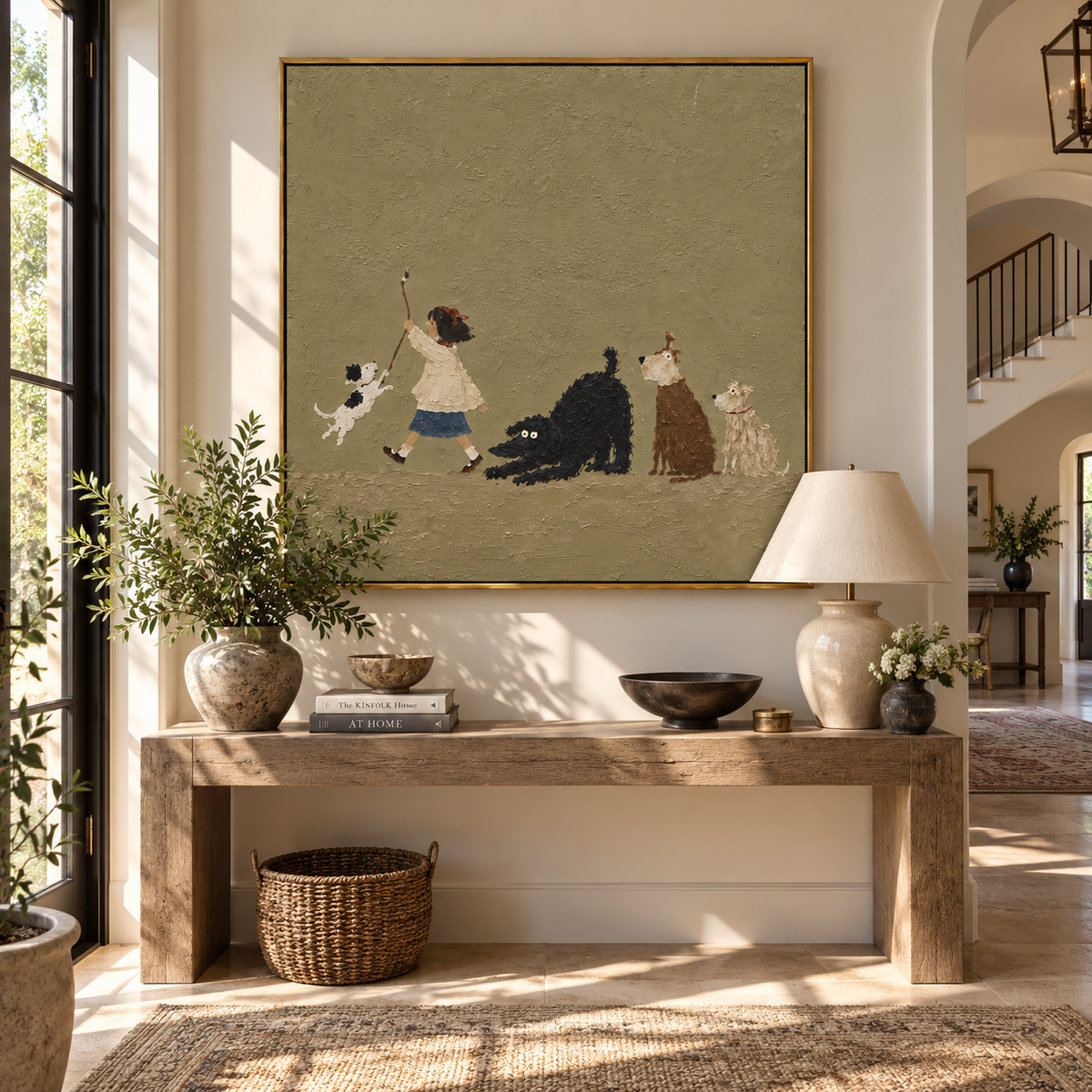 Cats Gather Around Play painting displayed above modern furnishings