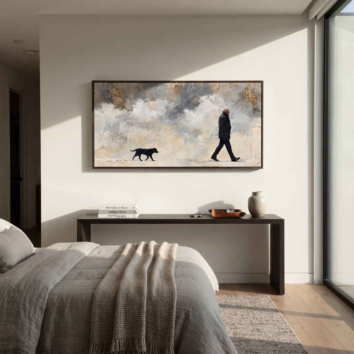 Snow Walk in Silence painting displayed above modern furnishings
