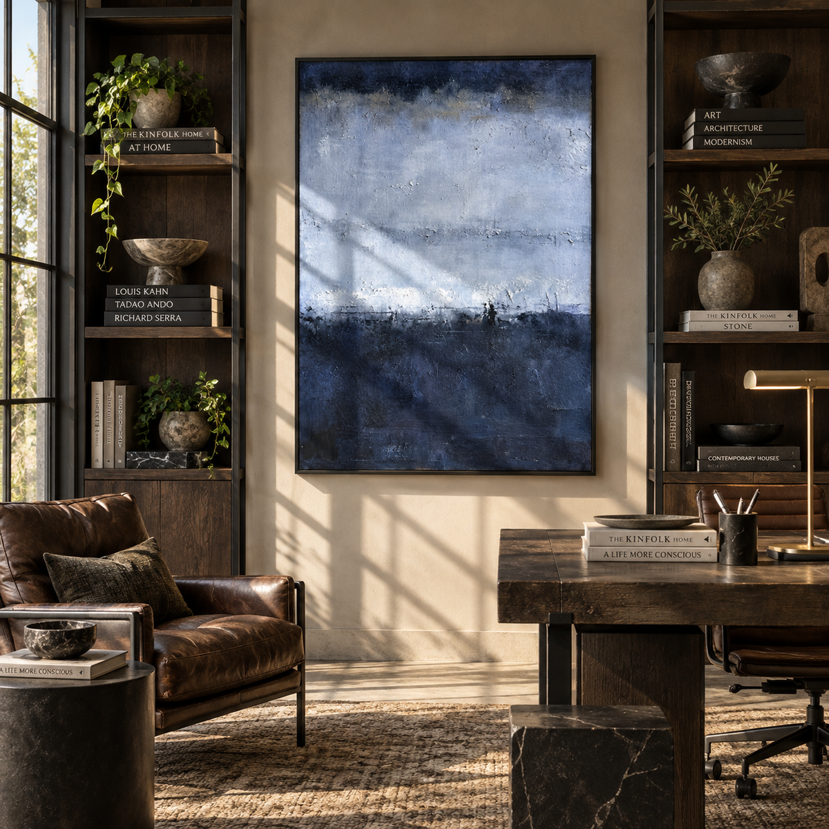 Fog Settles Over Blue blue gray atmospheric painting displayed in a modern interior