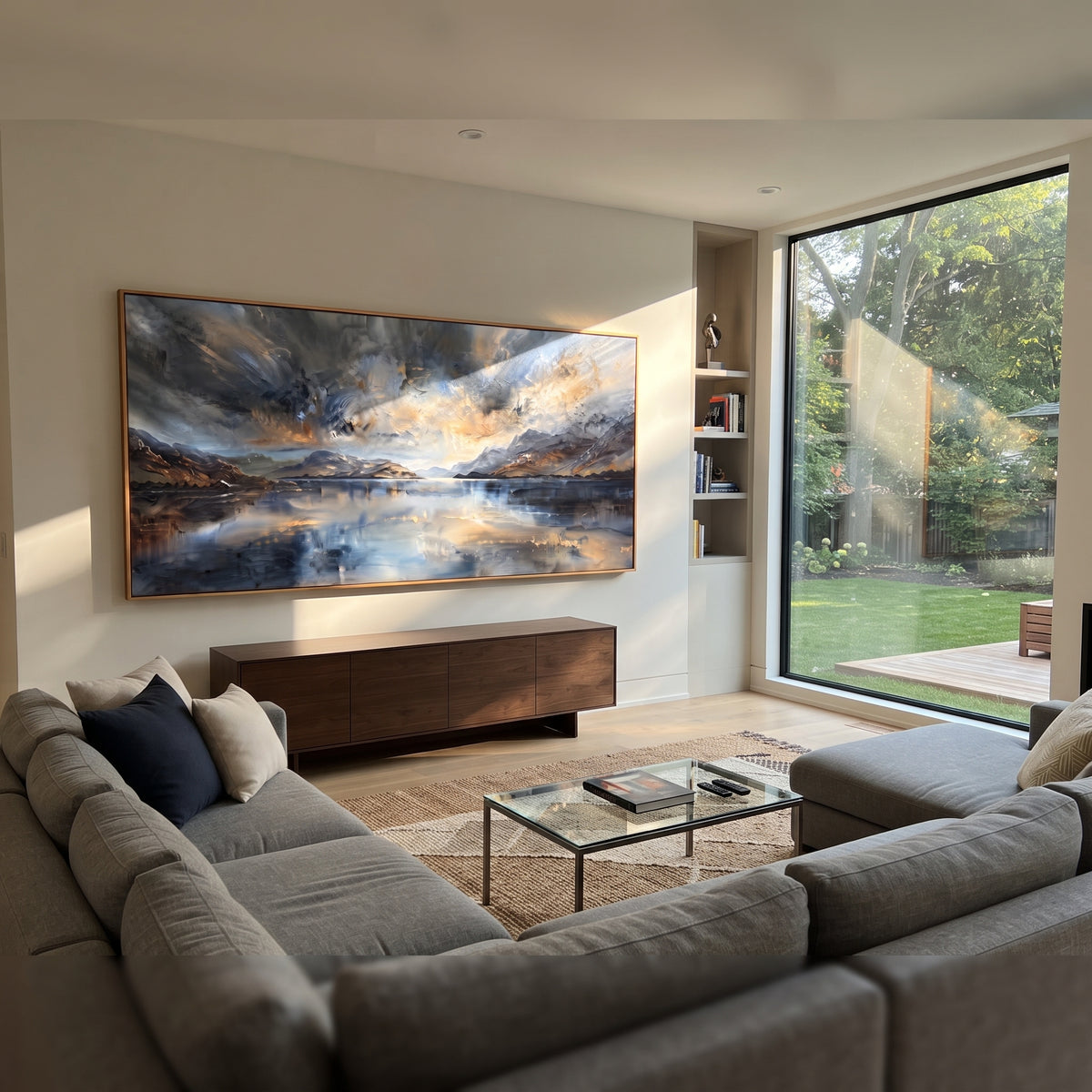 Storm Light Over Water blue storm lake landscape painting displayed in a styled interior