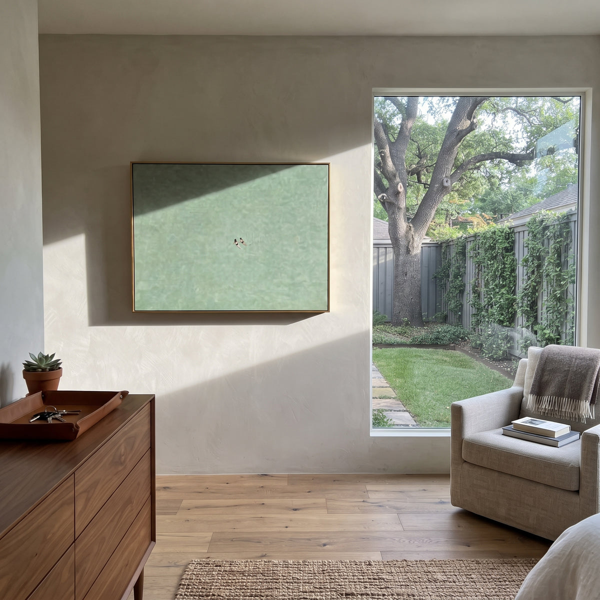 Two Figures Drift Far wall art shown above contemporary furnishings