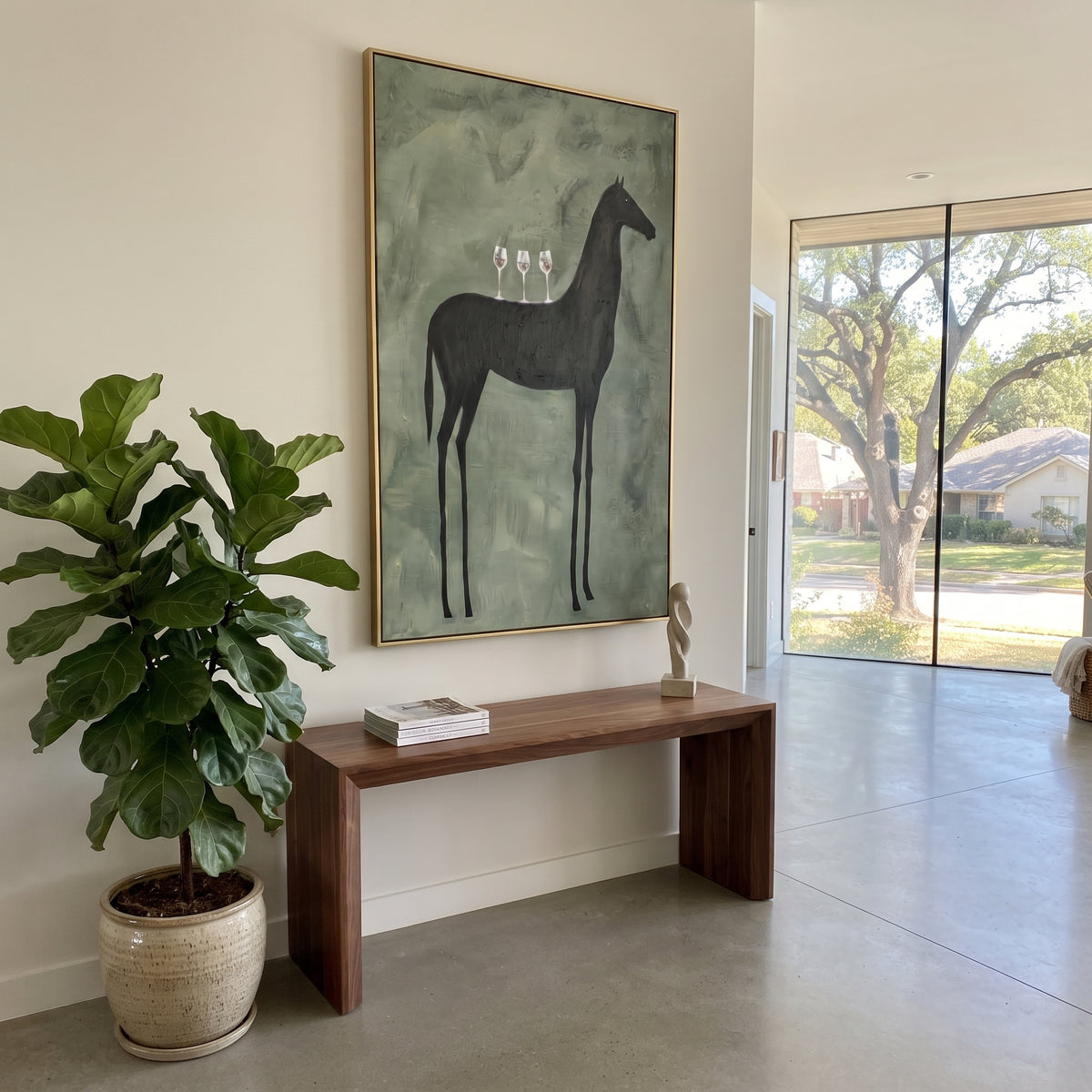 Black Horse Carries Toast wall art shown above contemporary furnishings