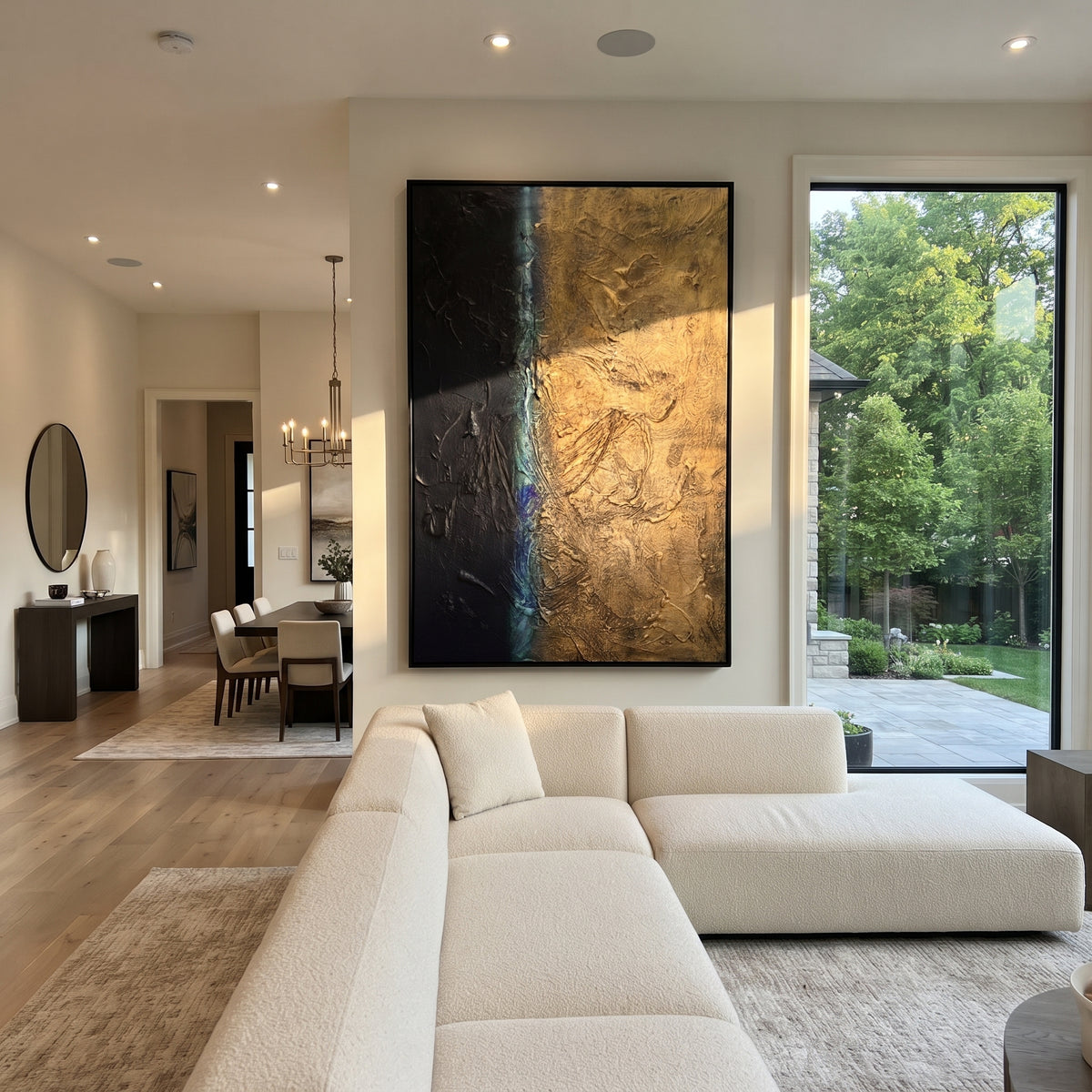Gilded Fault Line - black gold textured abstract painting displayed in a styled interior