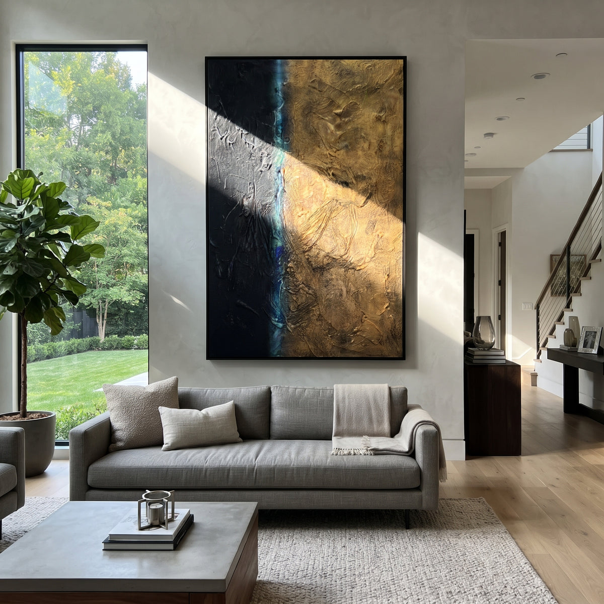 Gilded Fault Line - black gold textured abstract painting shown in modern room setting 2