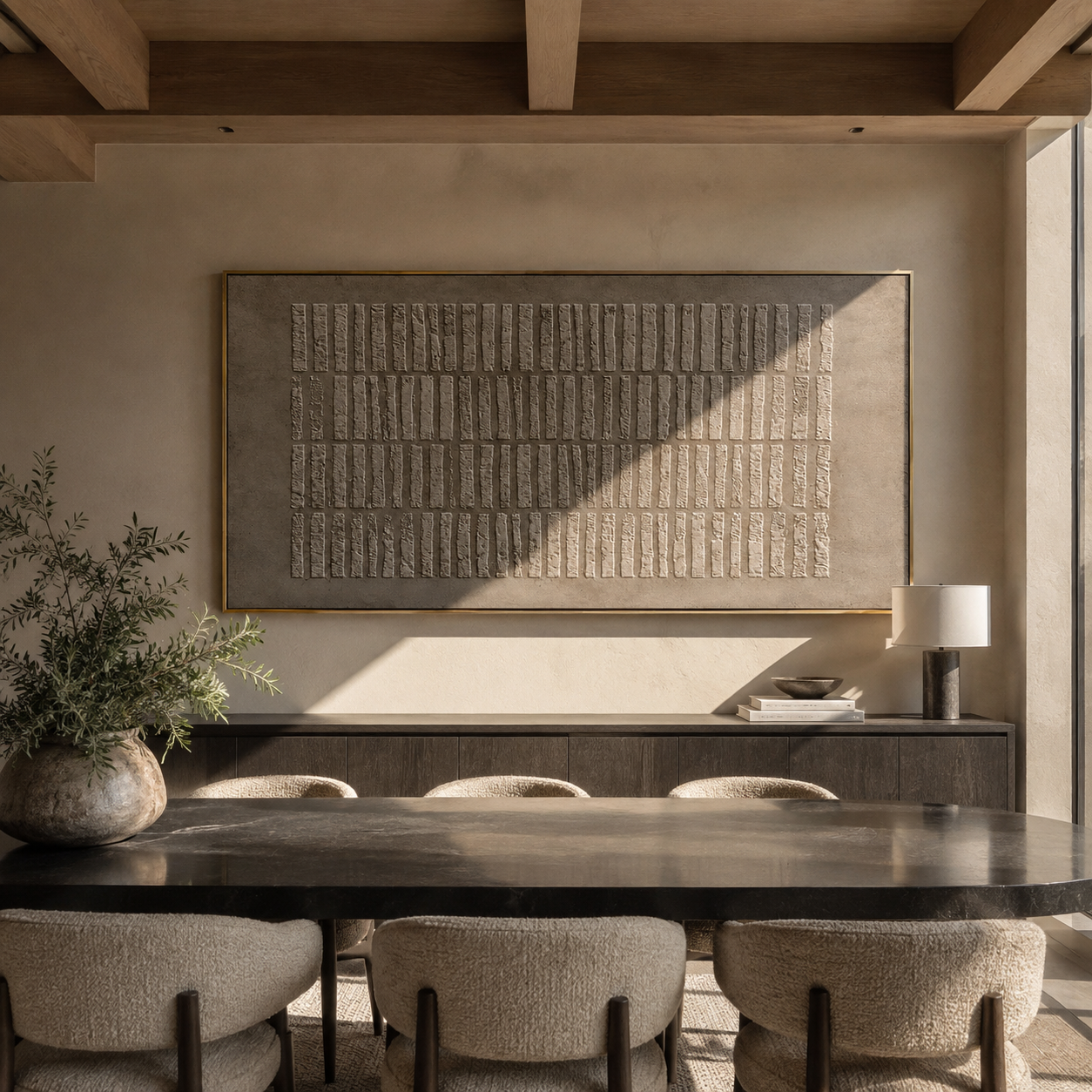 Taupe textured stone-strip painting displayed above a dark dining room sideboard
