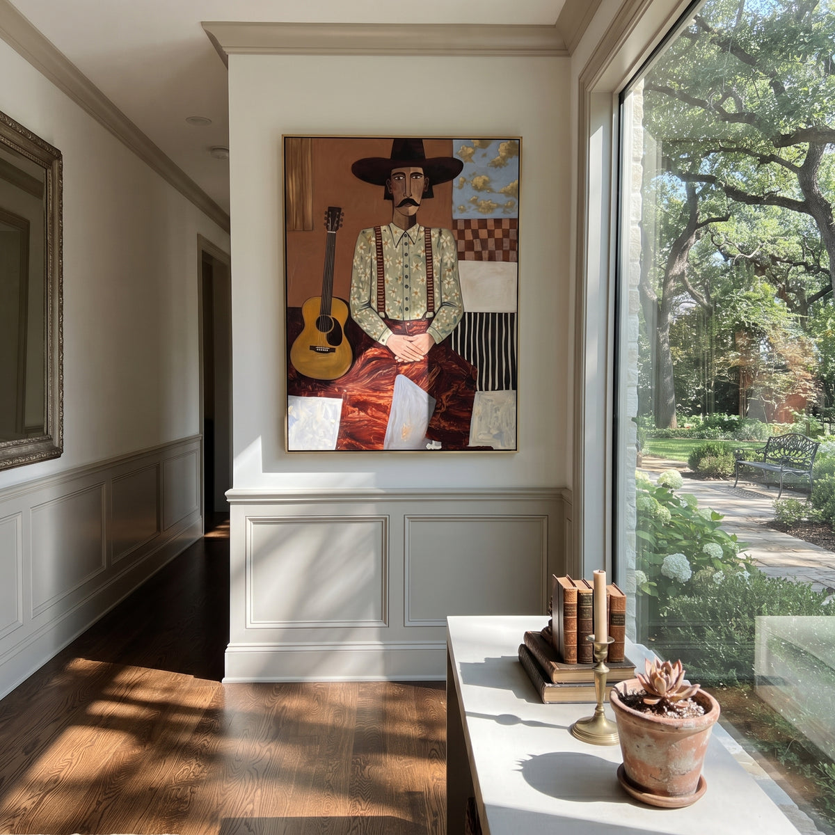 Guitar Waits Beside Him – seated guitar cowboy, contemporary Western vertical wall art - displayed along a stair landing