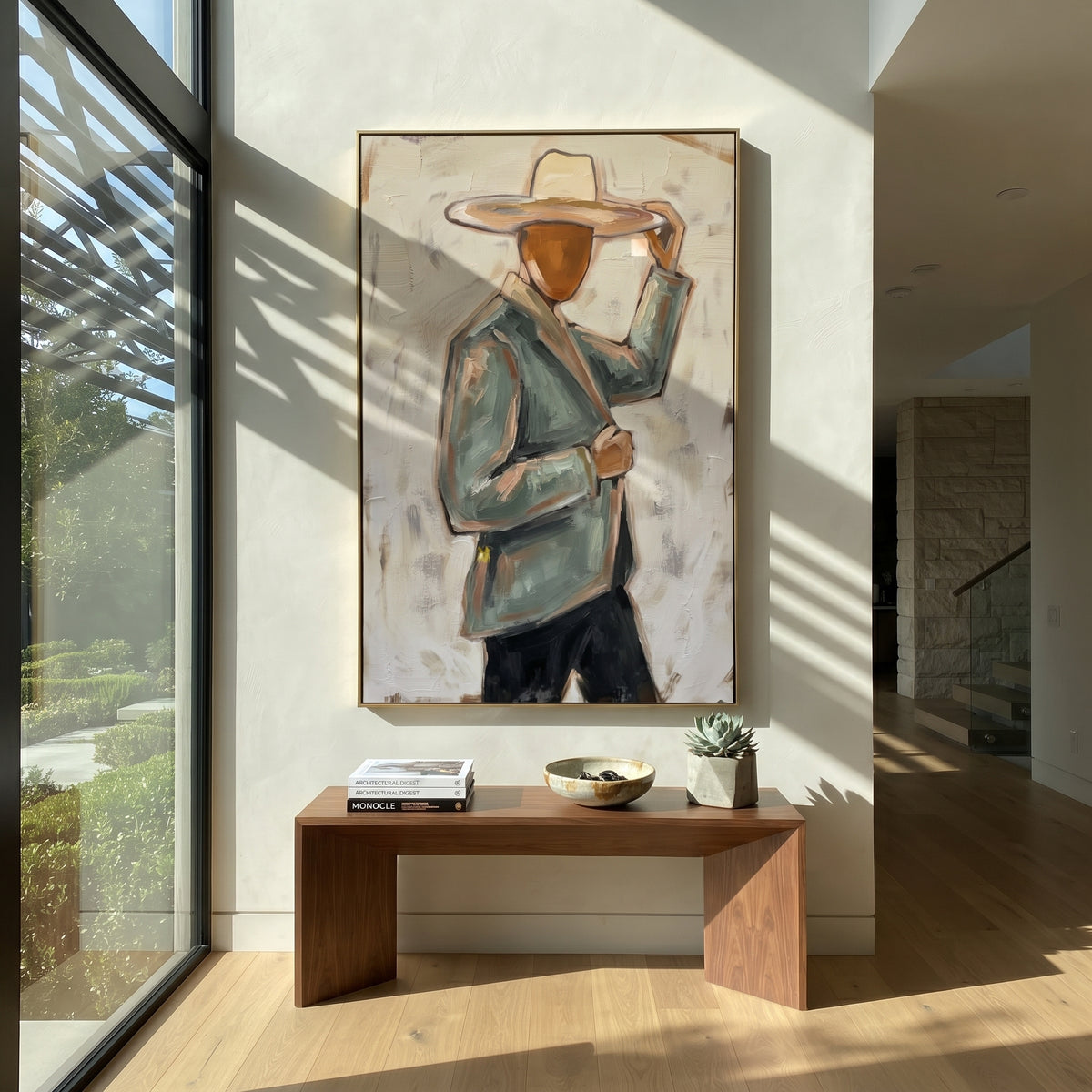 Pale Brim Holds Balance – green jacket cowboy portrait, contemporary Western vertical wall art - displayed in a quiet reading corner