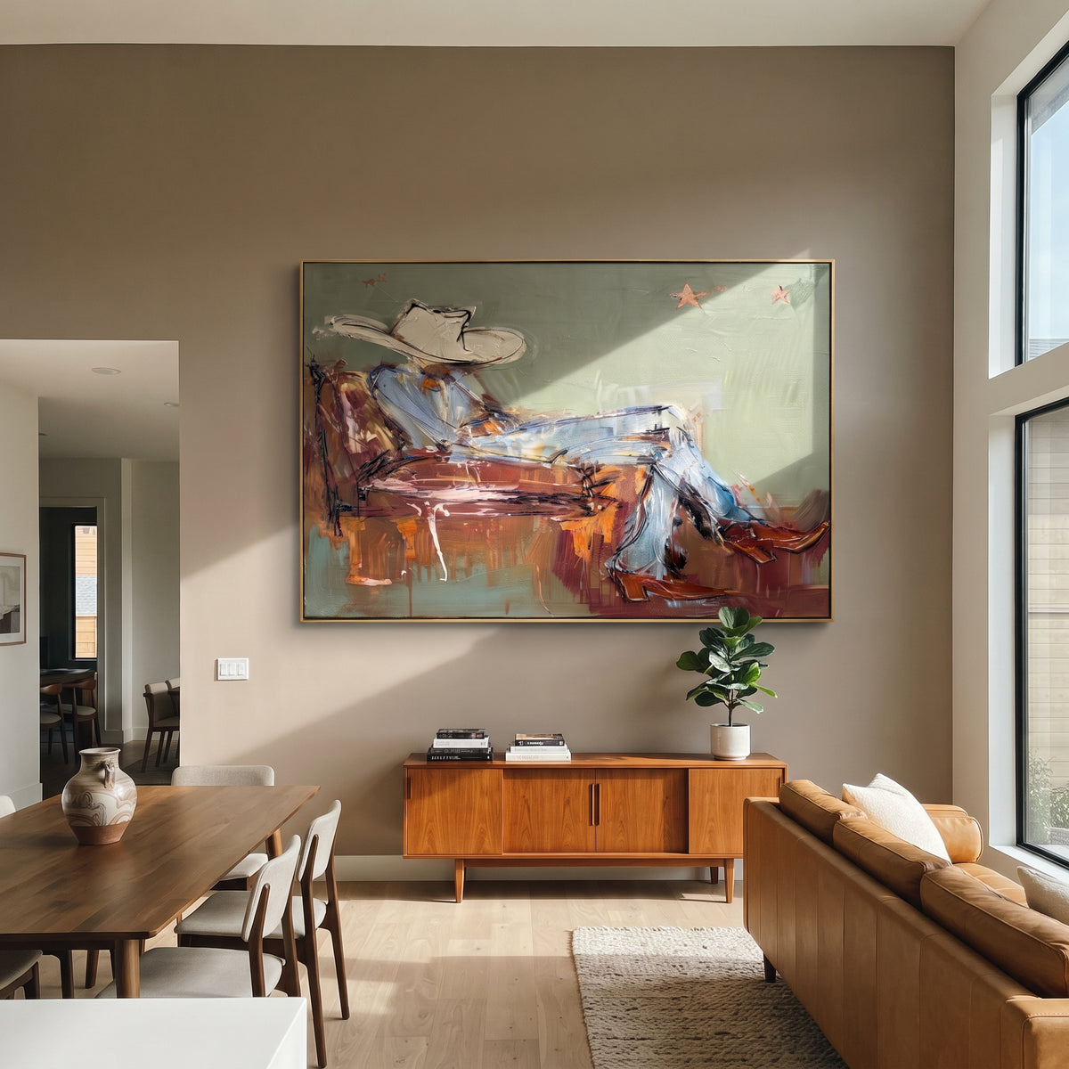 Quiet Hours in Sage - reclining cowboy painting shown in modern room setting 5
