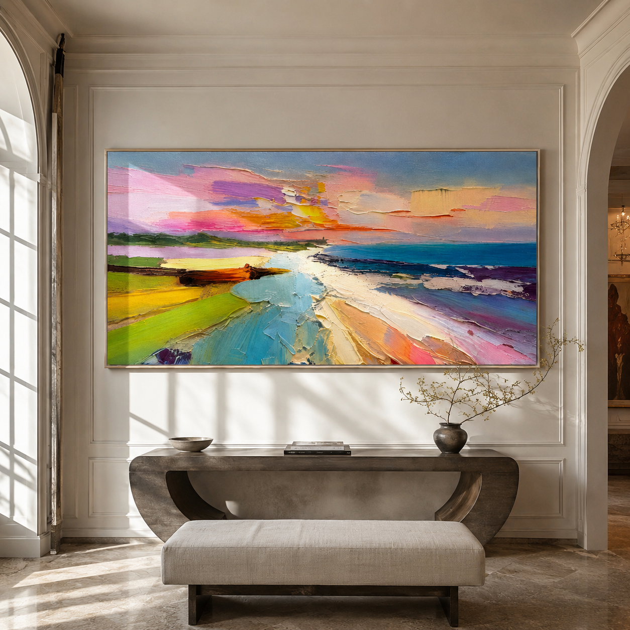 Vibrant coastal sunset canvas hung above an entryway console table