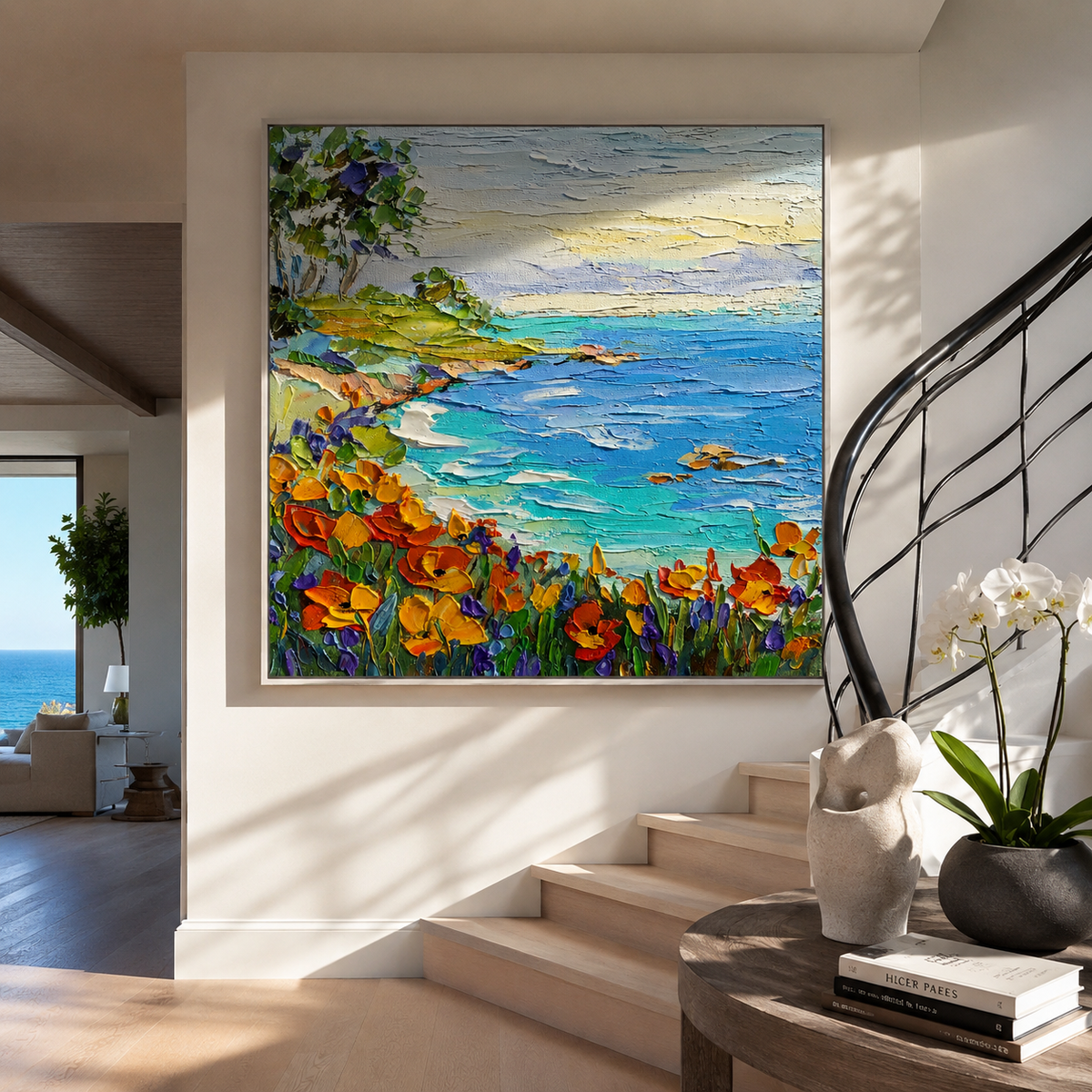 Cliffside village painting displayed above a console table in an entryway