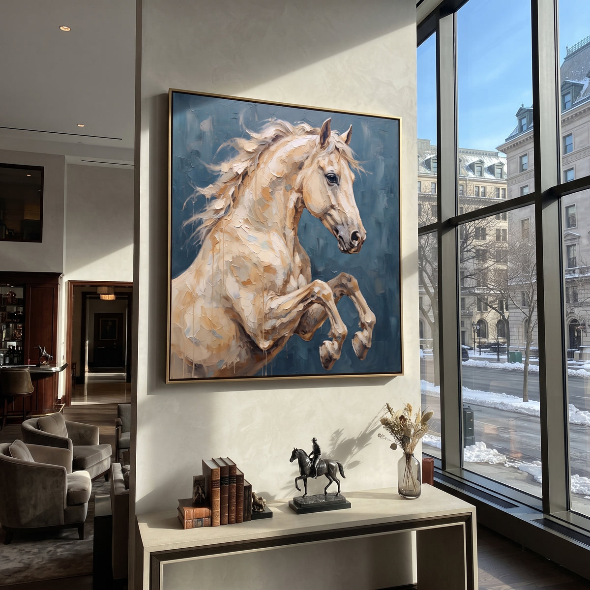 The Pale Stallion Rises - rearing white horse painting, square textured equestrian wall art - displayed beside a modern lounge chair