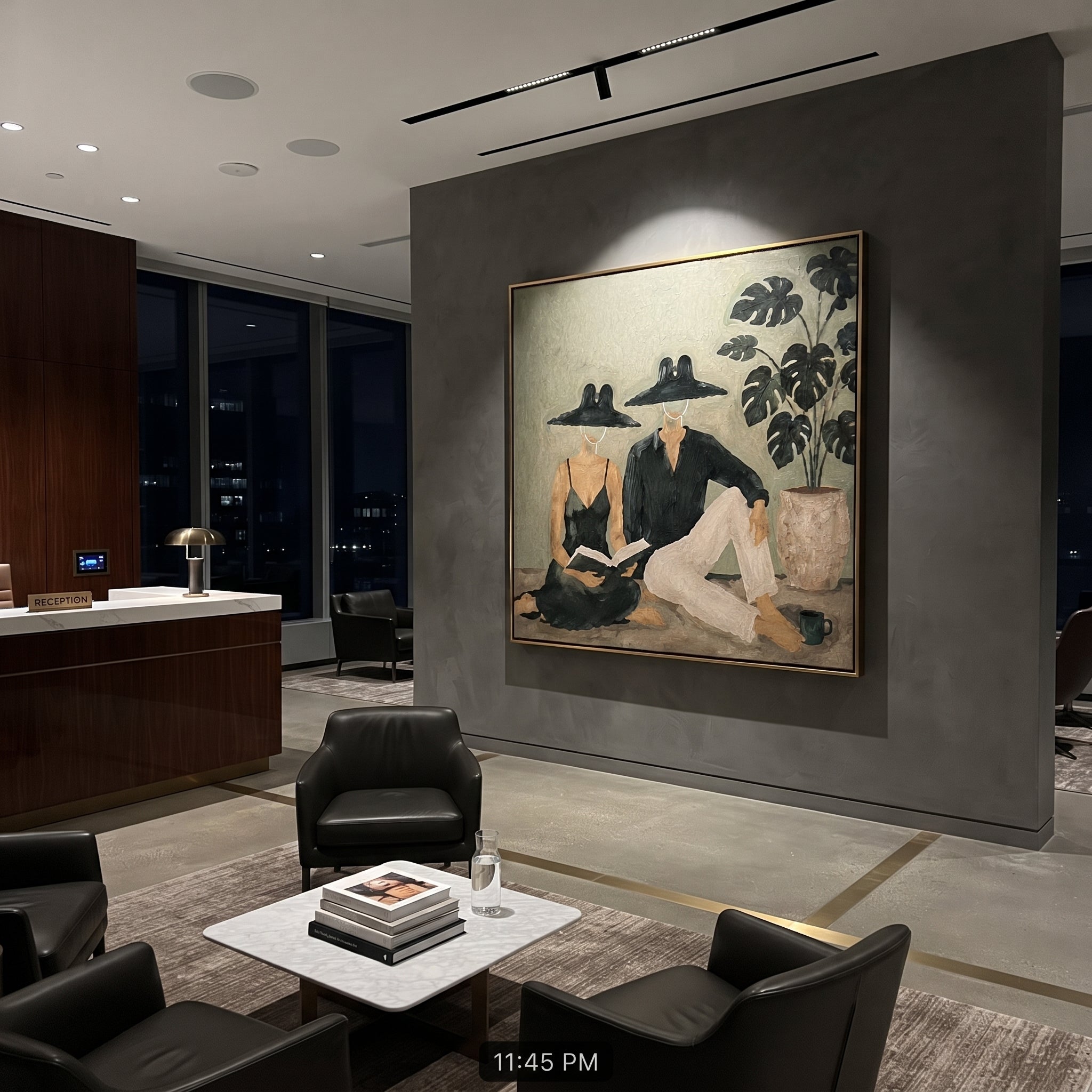 Black Hats Read Together styled with neutral modern furnishings