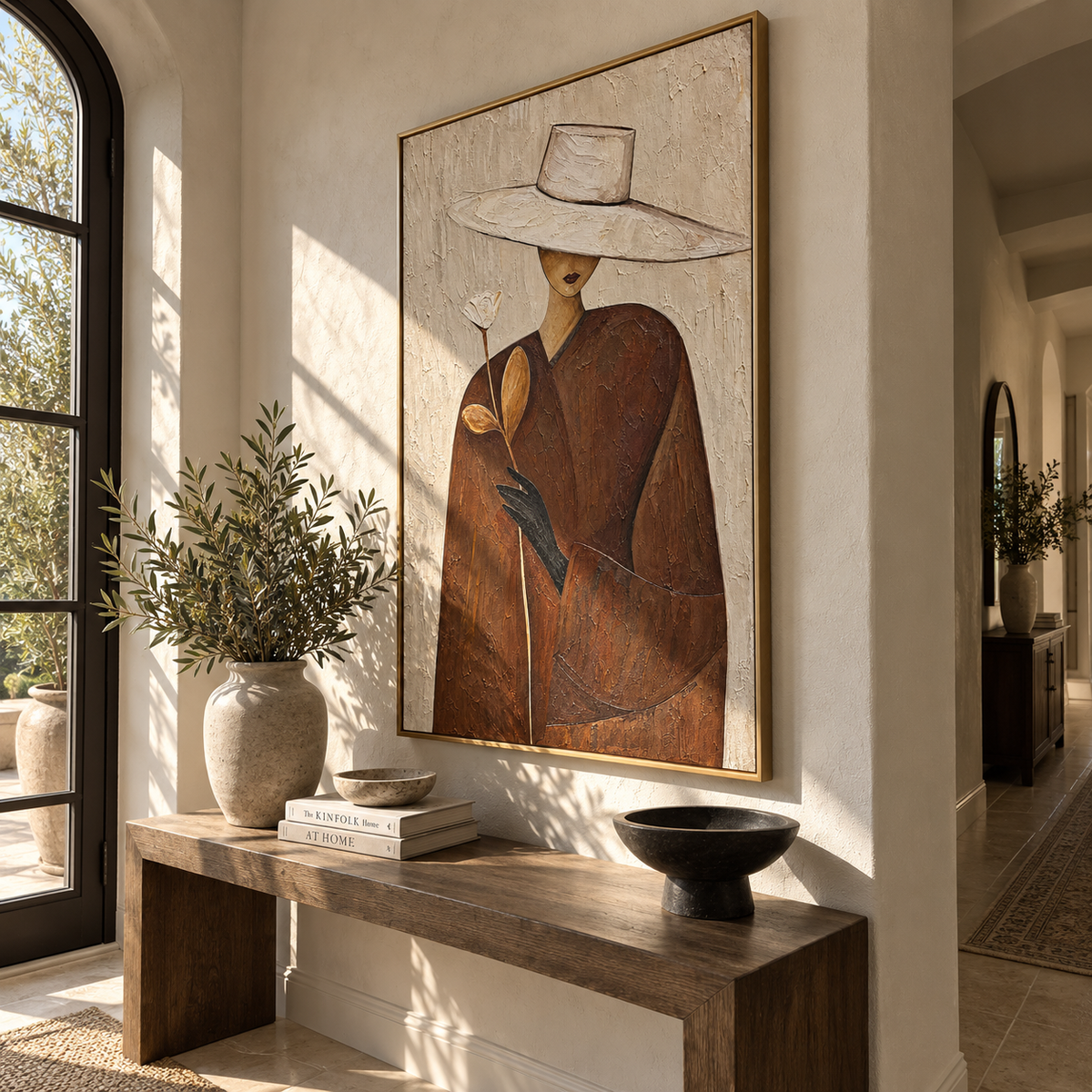 Ivory Bloom – woman in white hat holding flower, Retro Modern vertical wall art - displayed through an entryway
