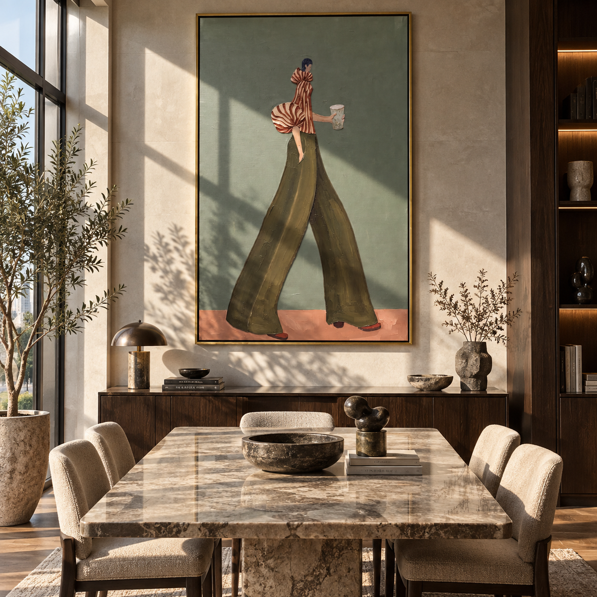 Striped Steps in Olive – dark-haired woman in a red striped puff-sleeve blouse and deep olive wide-leg trousers holding a cup, displayed in a styled contemporary interior