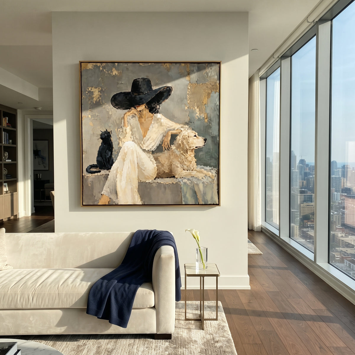 Black Brim Quiet Company seated woman and cat painting displayed in a styled interior