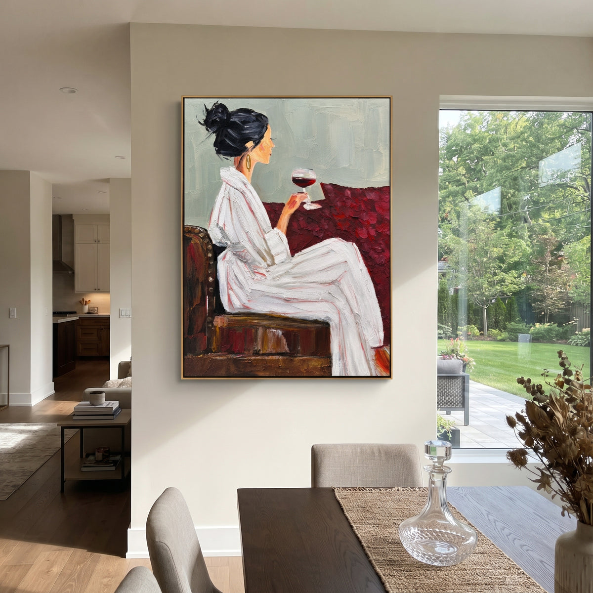 Quiet Wine in Profile - woman holding wine portrait painting displayed in a styled interior