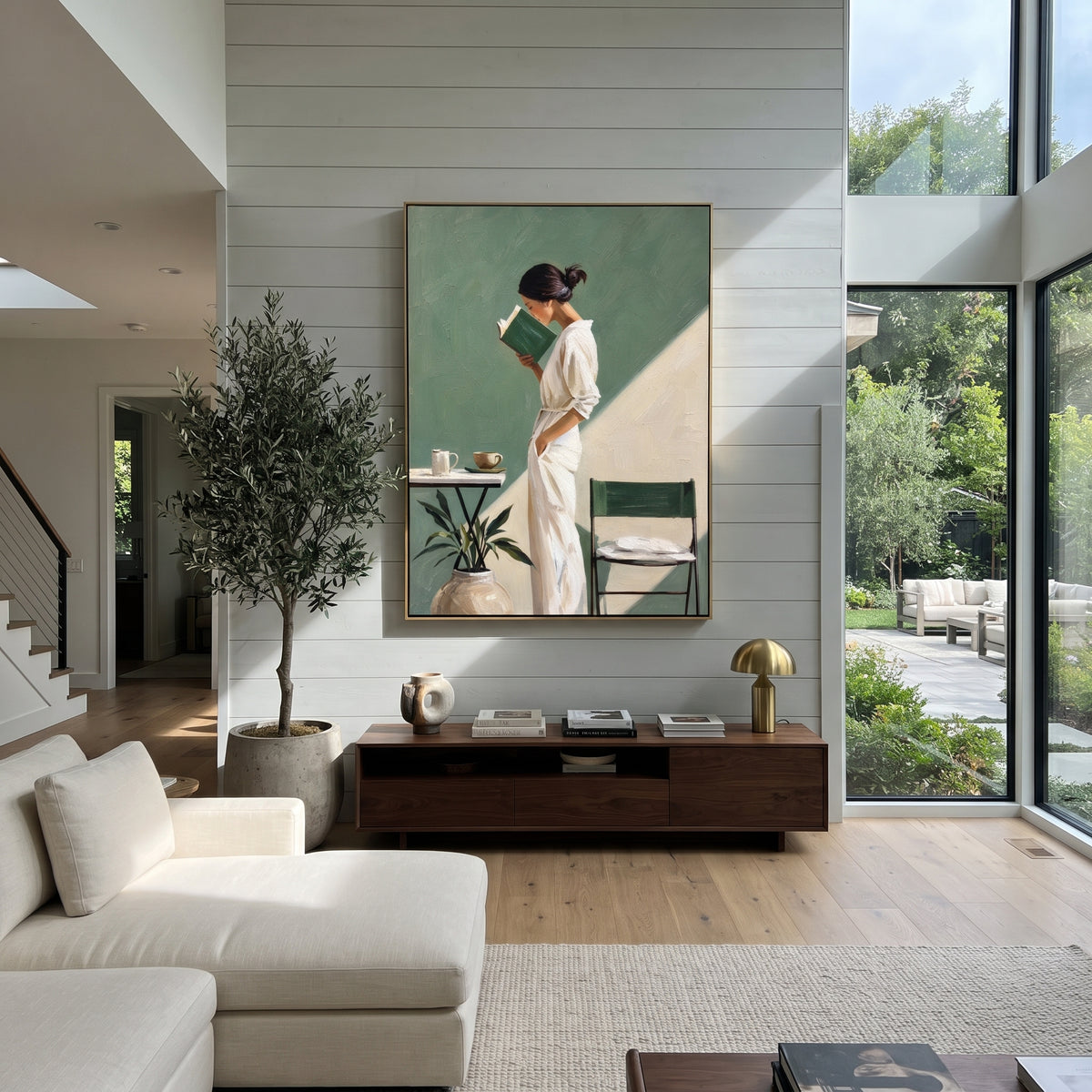 Reading in Sage Light - woman reading in sage interior painting shown in modern room setting 3