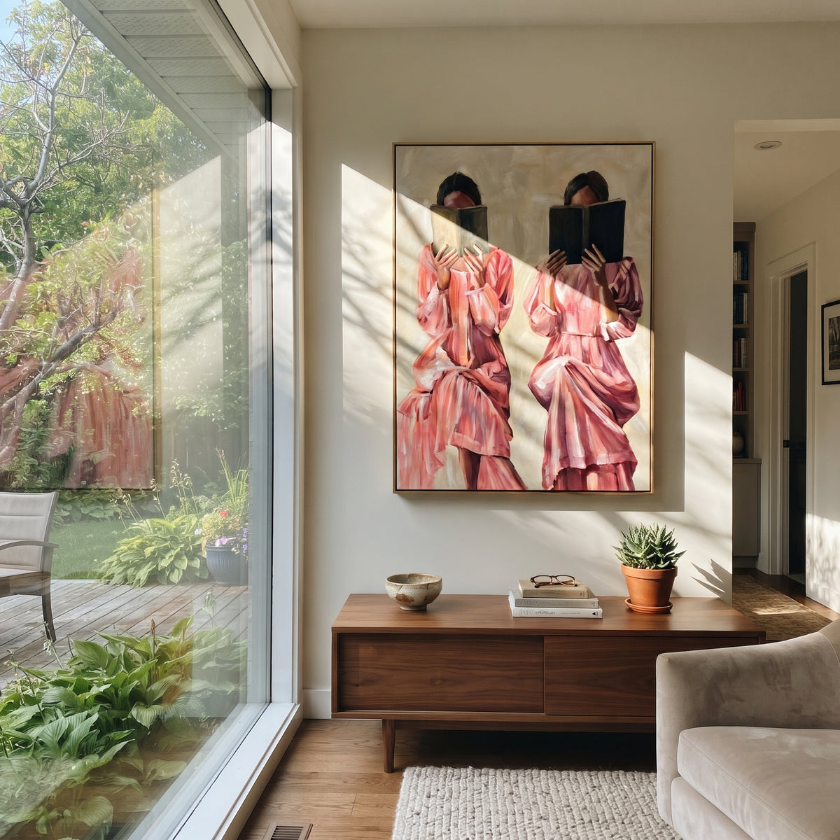 Twin Readers in Rose - two women reading painting shown in modern room setting 5