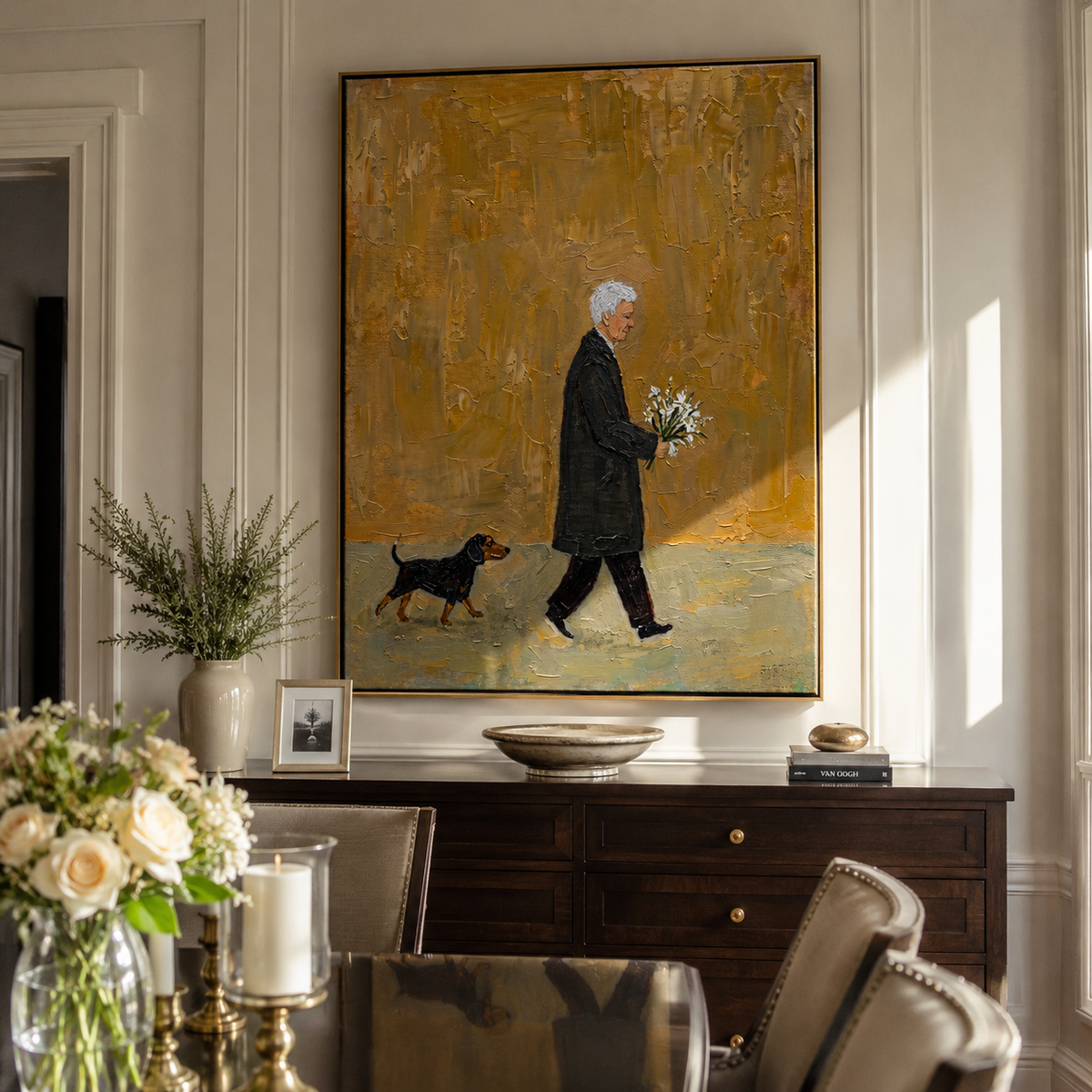 Amber Field Carries Flowers elder walking black dog painting displayed in a styled interior