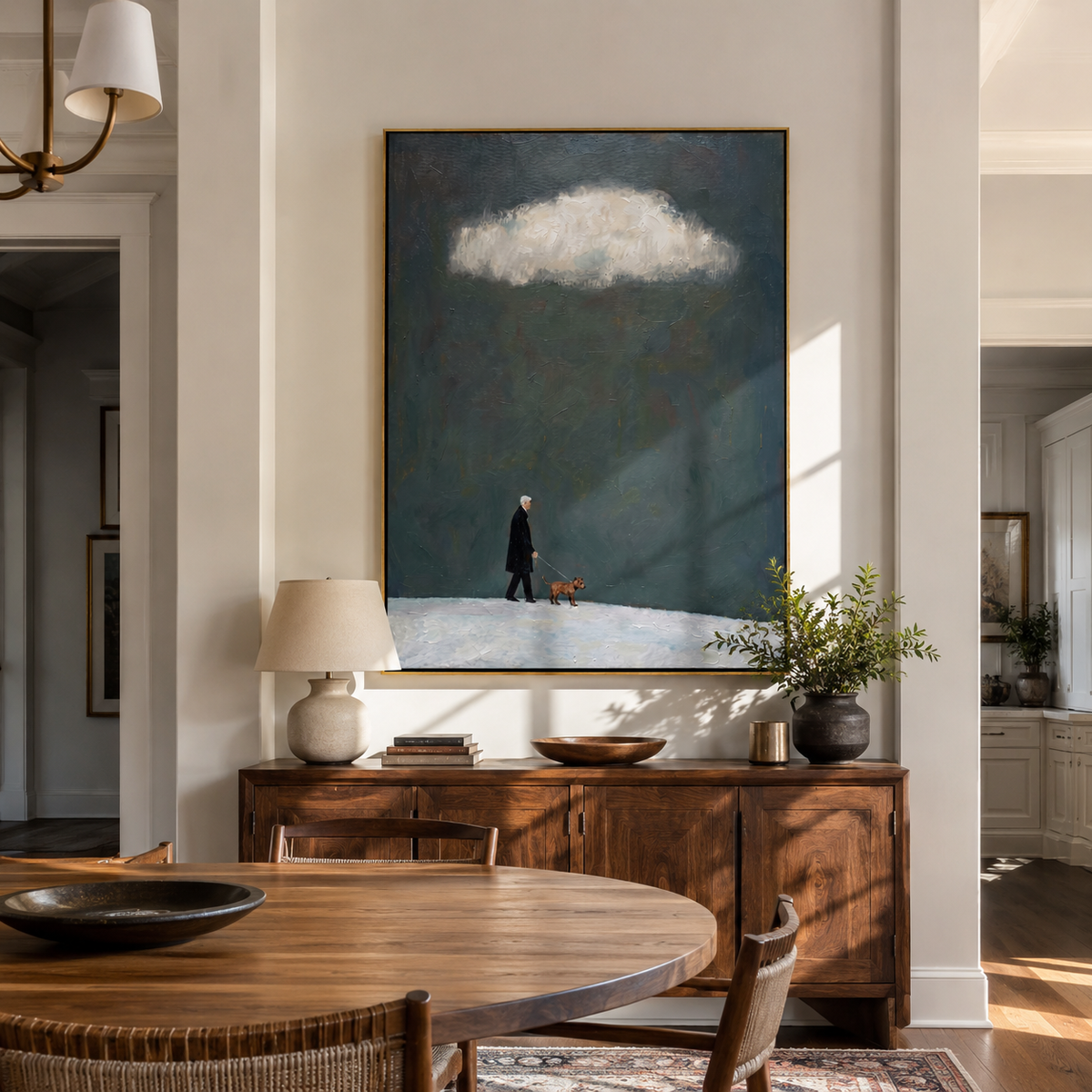 Storm Cloud Small Company person and dog storm painting displayed in a styled interior