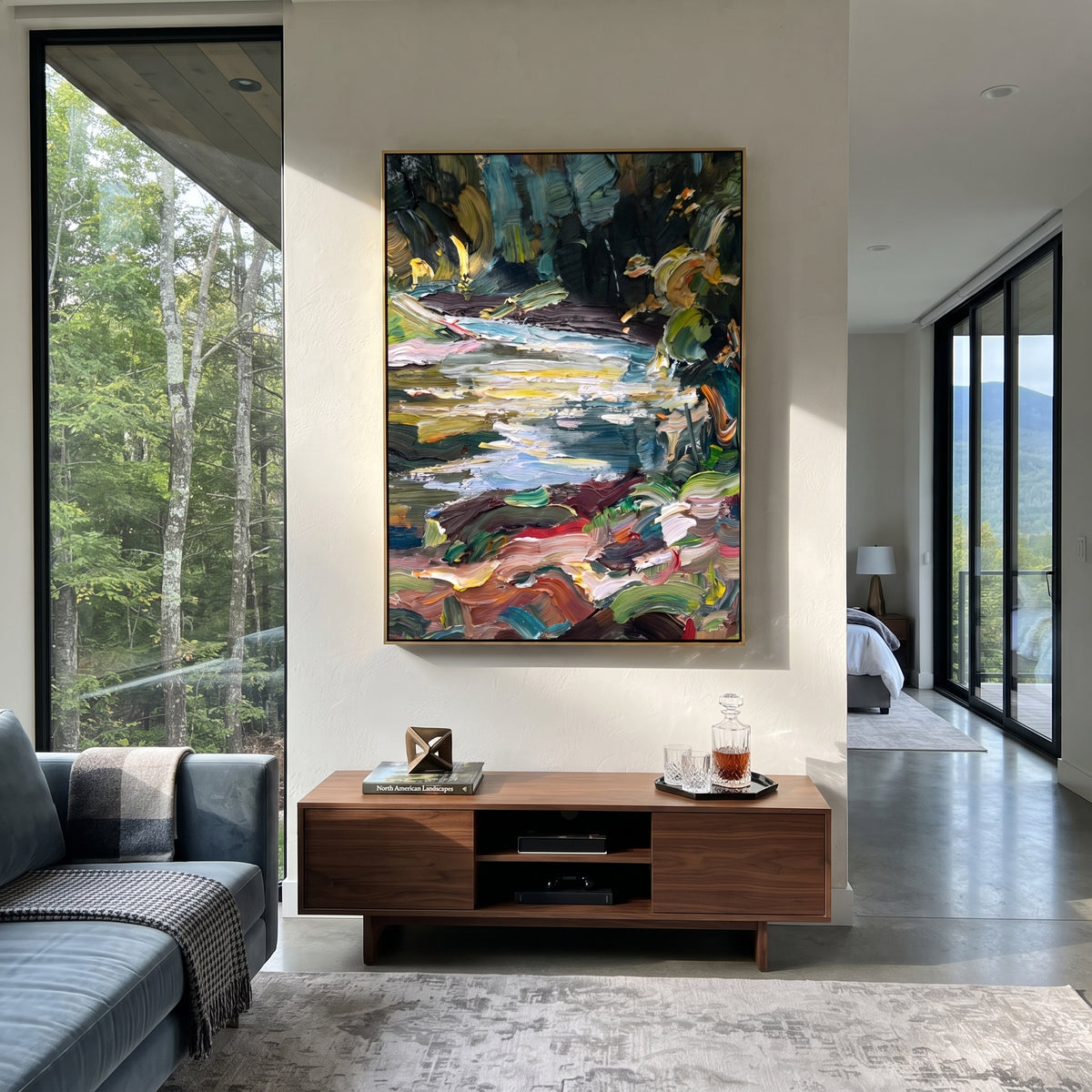 Forest Stream in Motion colorful forest stream painting displayed in a styled interior