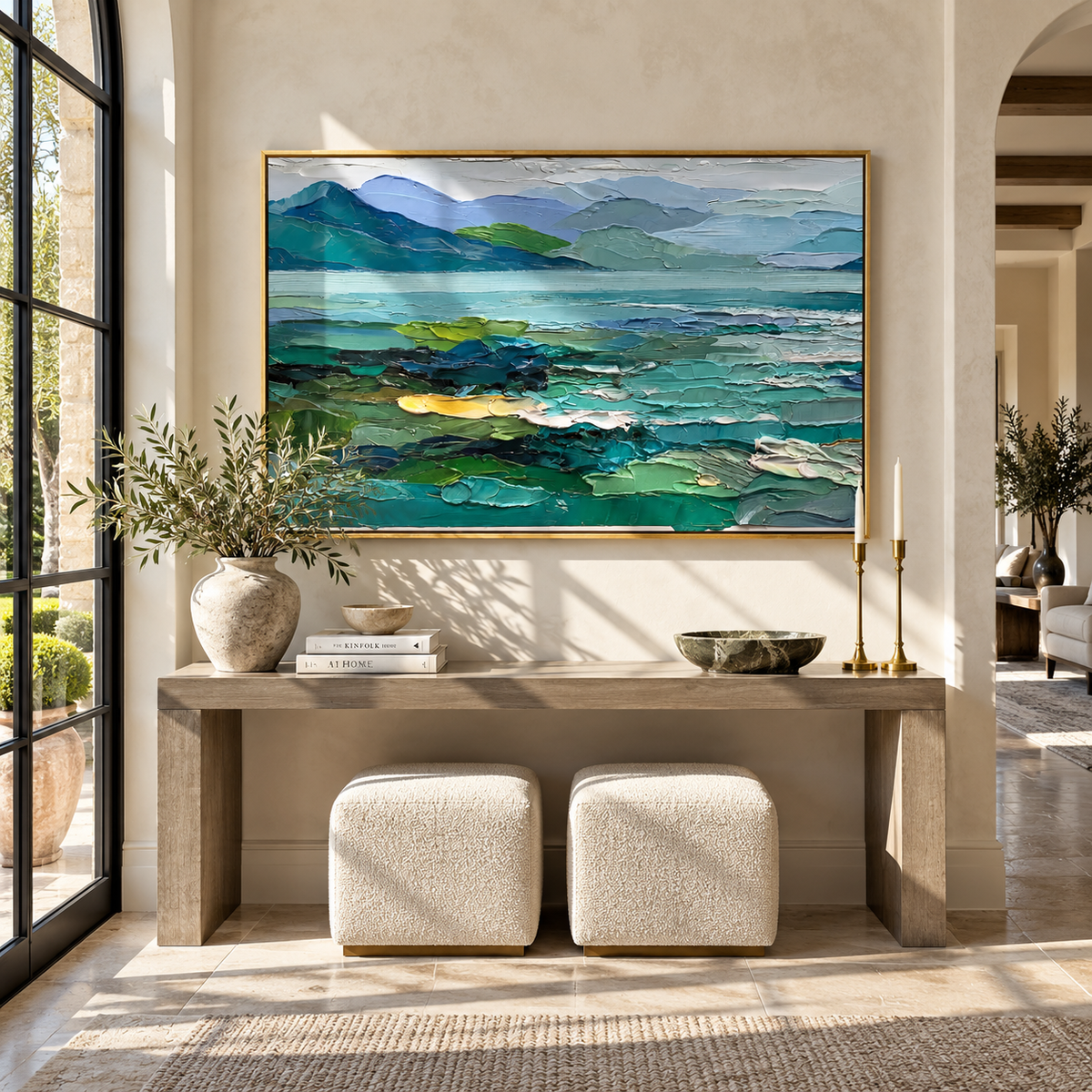 Lake Between Green Hills turquoise lake landscape painting displayed in a styled interior