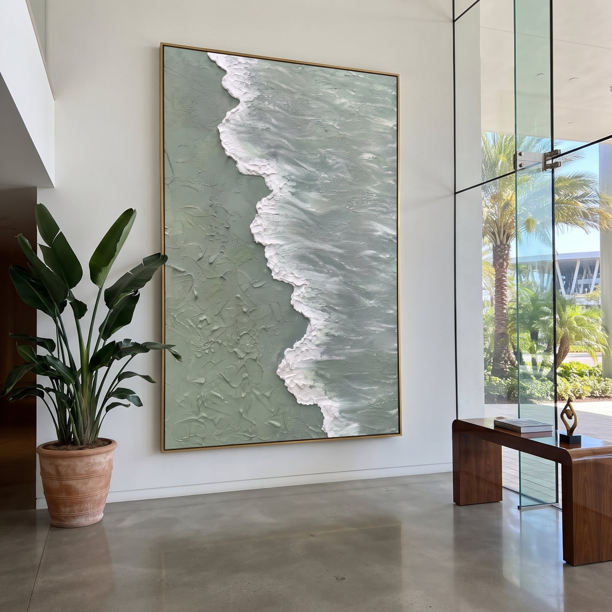 Foam Meets Sage Shore aerial sage green ocean painting displayed in a styled interior