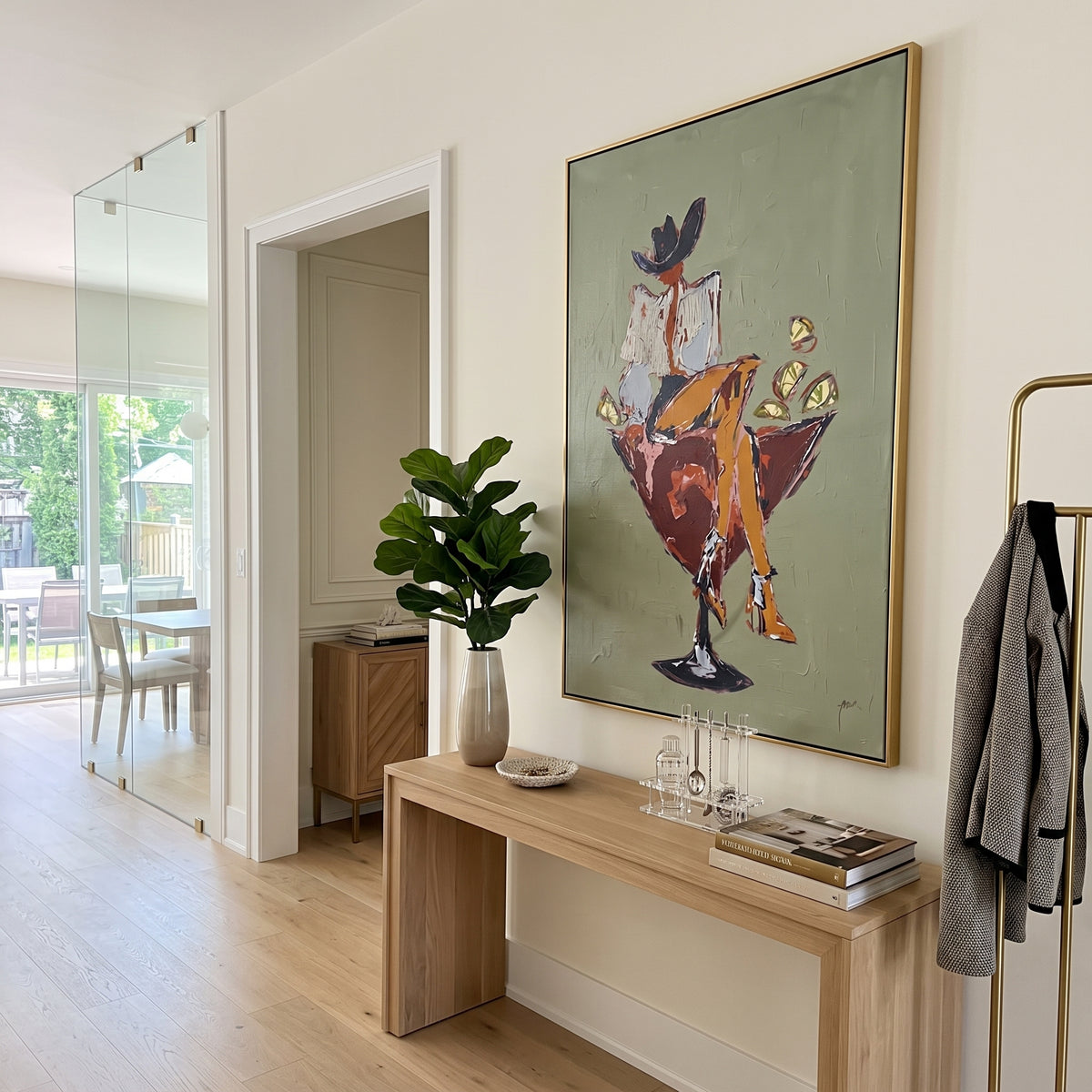 Cocktail Muse in Sage wall art shown above contemporary furnishings