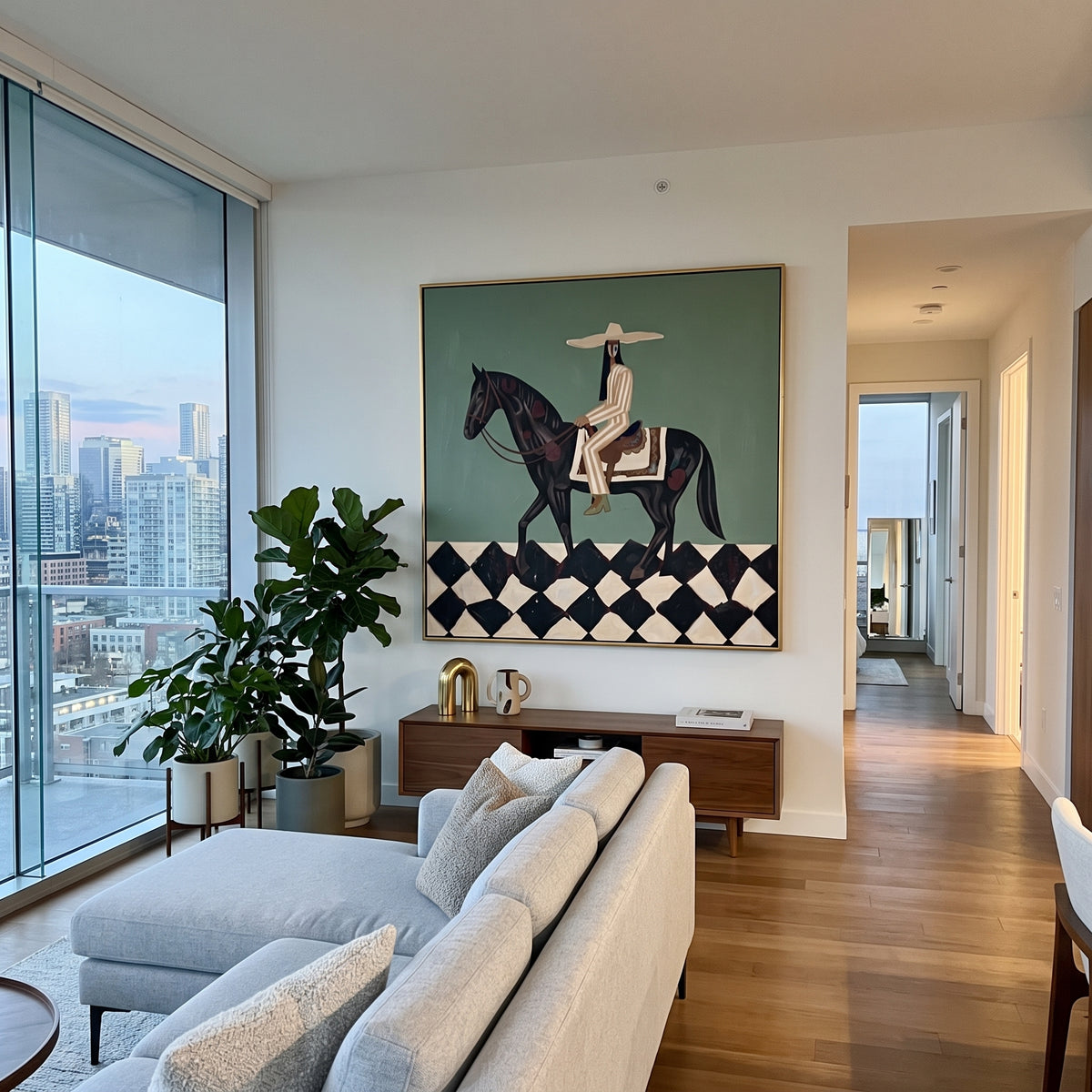 Cowgirl Crosses Black Diamonds modern western horsewoman painting displayed in a styled interior