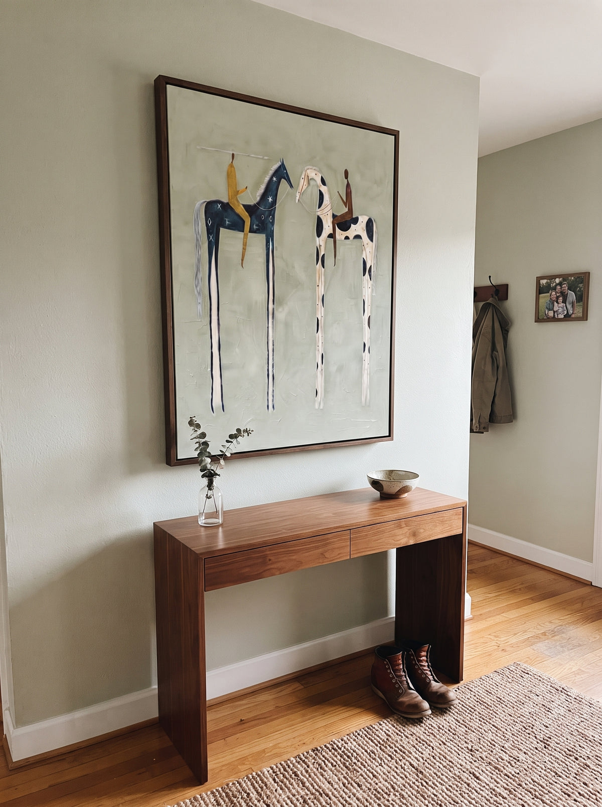 Tall Horses Share Sky displayed with natural materials and quiet decor