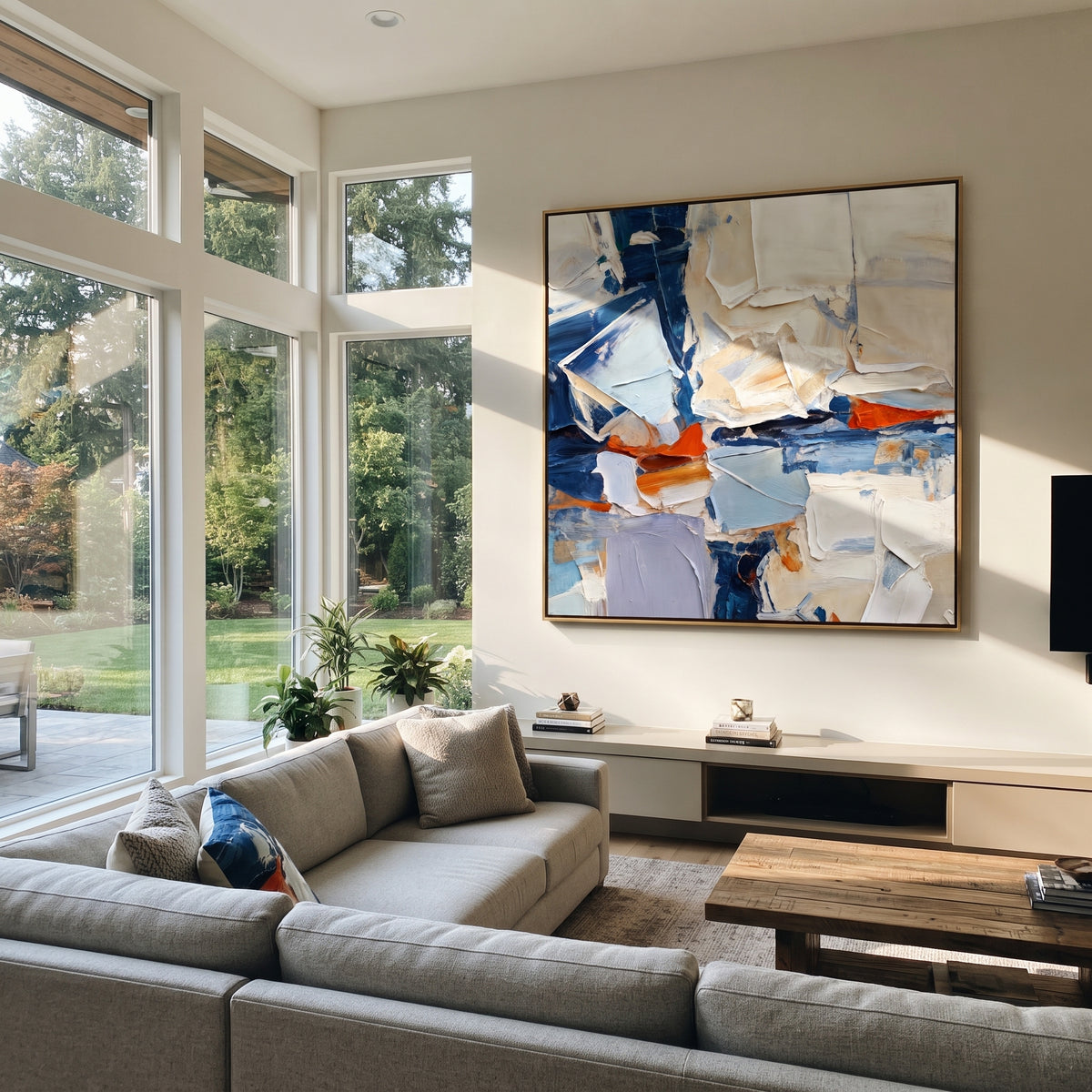 Blue Fragments Reassembled blue white geometric square painting displayed in a styled interior