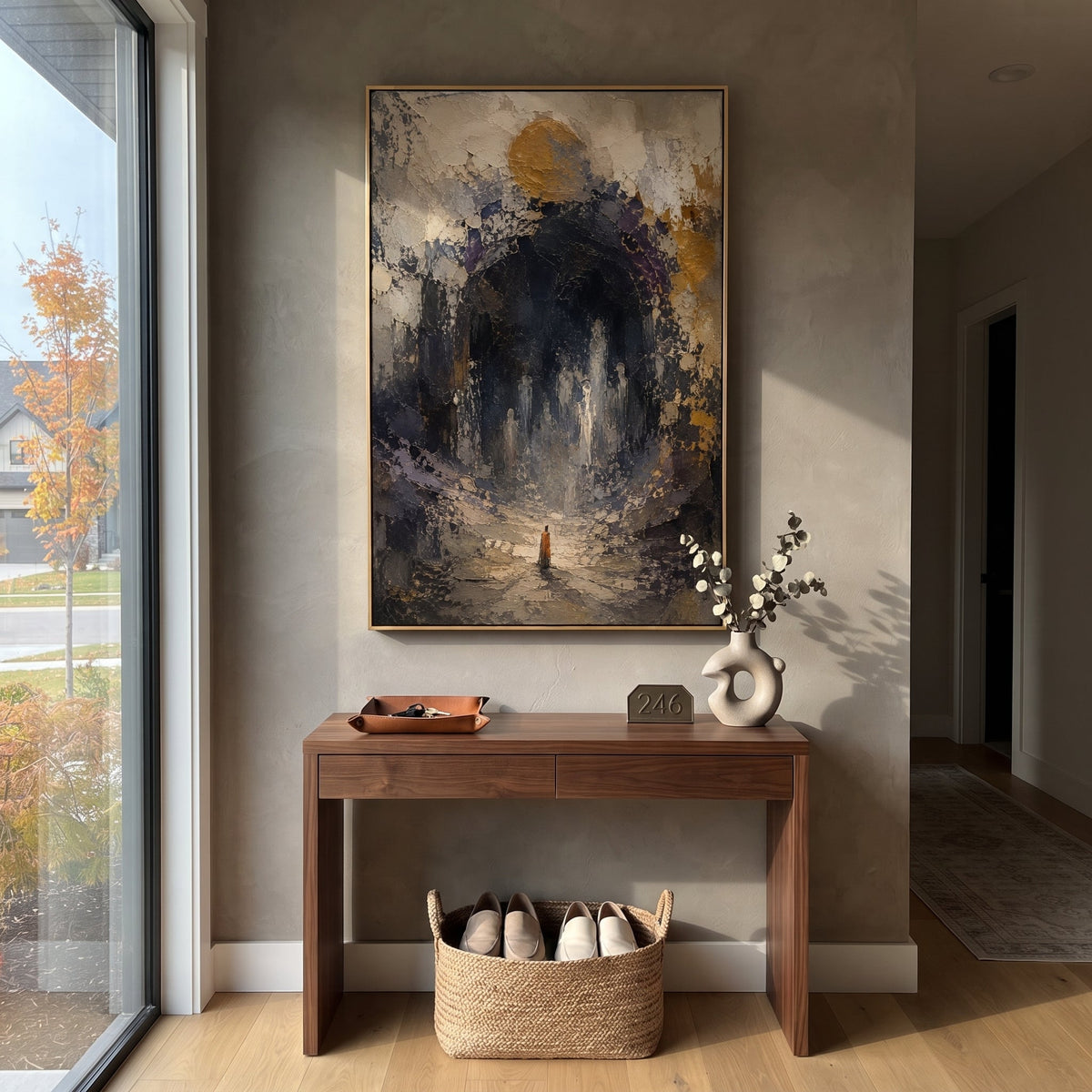 "Odysseus At Hades Gate" stages a lone orange-robed figure before a black monumental arch, surrounded by ghostly marks and a muted golden moon. The scene recalls the hero descent to the underworld, where he seeks prophecy among the dead before continuing home. Heavy black, grey and ochre plaster gives the doorway ancient weight, making the entrance feel sacred and dangerous. This vertical work brings solemn mythic depth to studies, libraries, bedrooms and entryways, translating the Hades episode