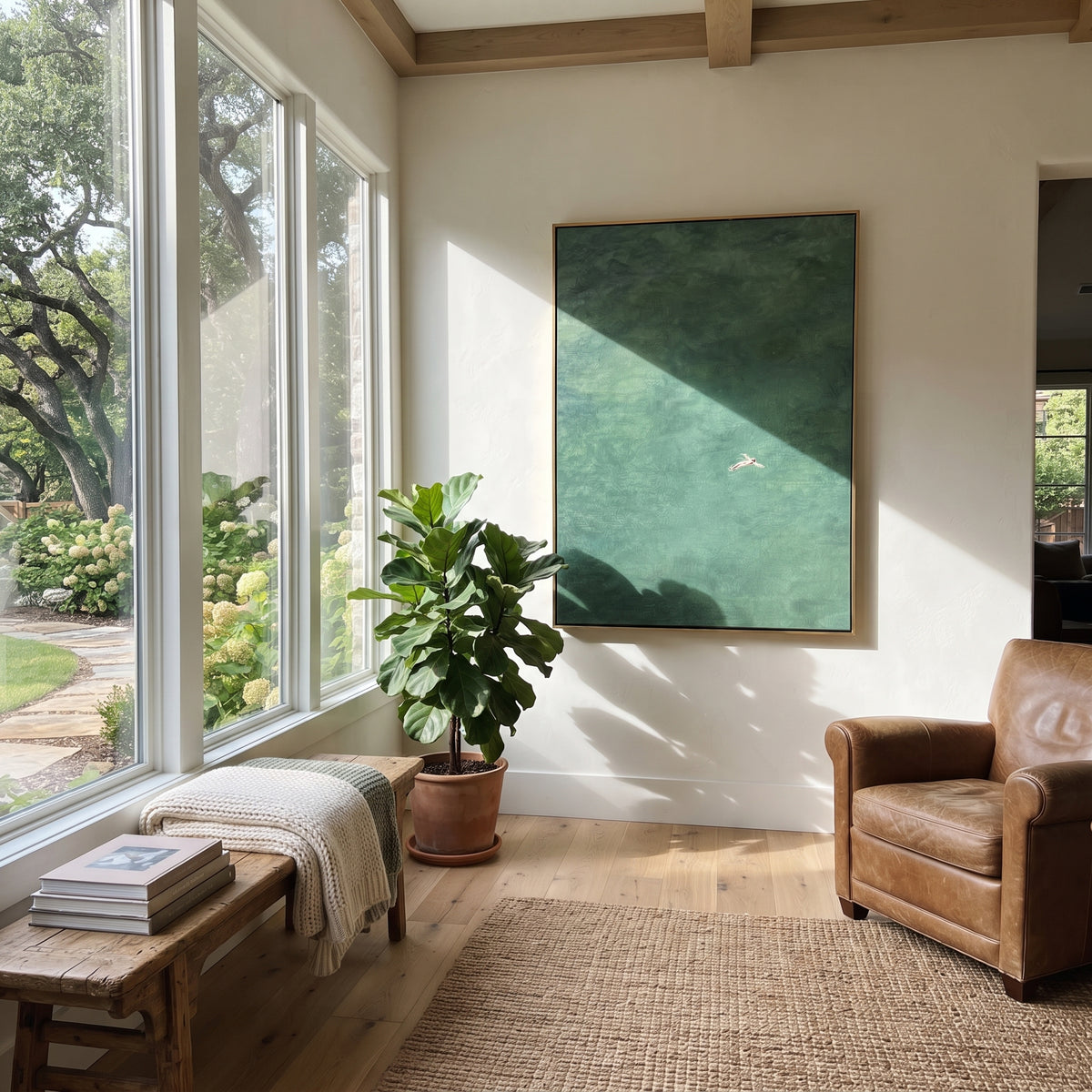 Distant Swimmer in Teal - swimmer painting displayed in a styled interior