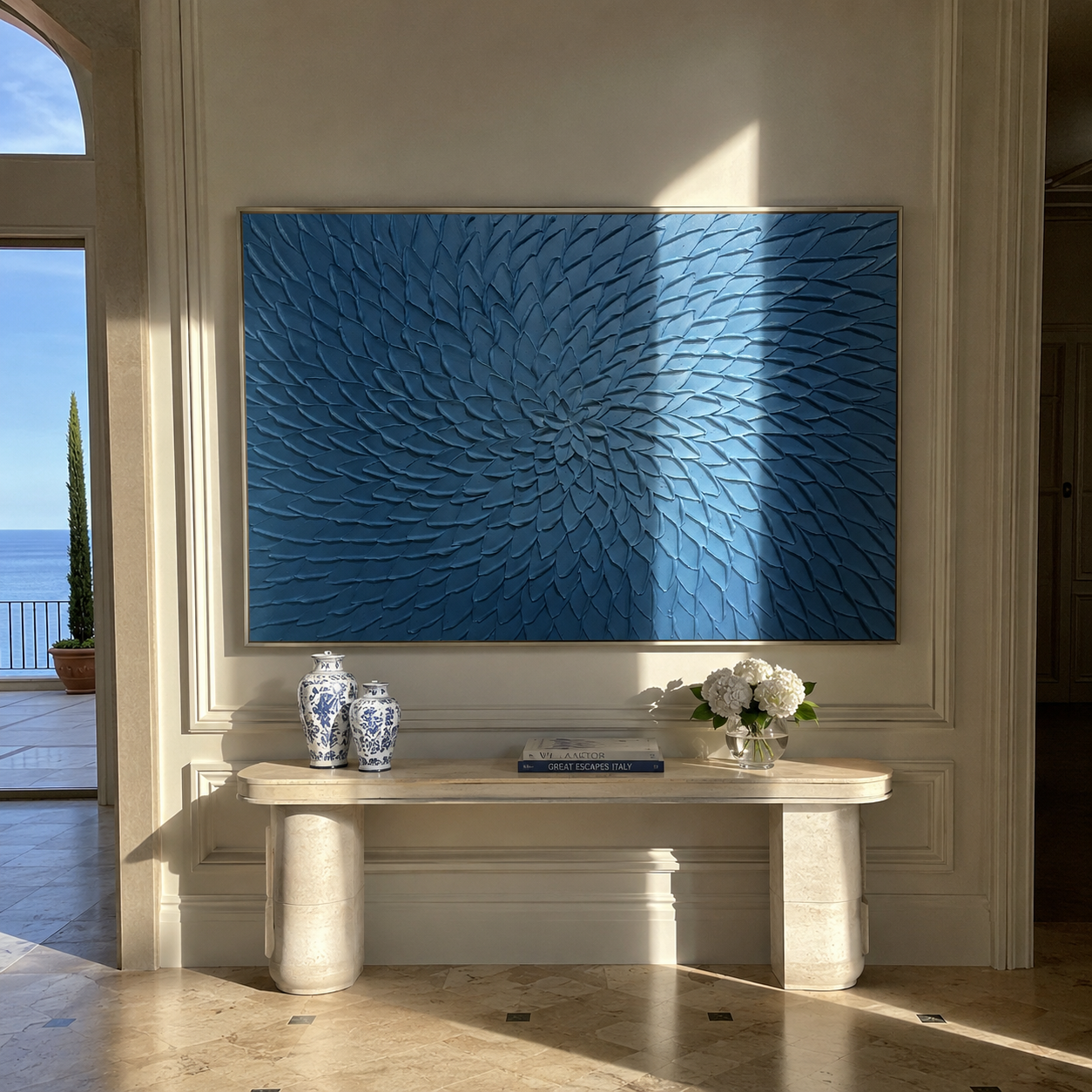 Deep blue sculptural bloom painting displayed above an entryway console table