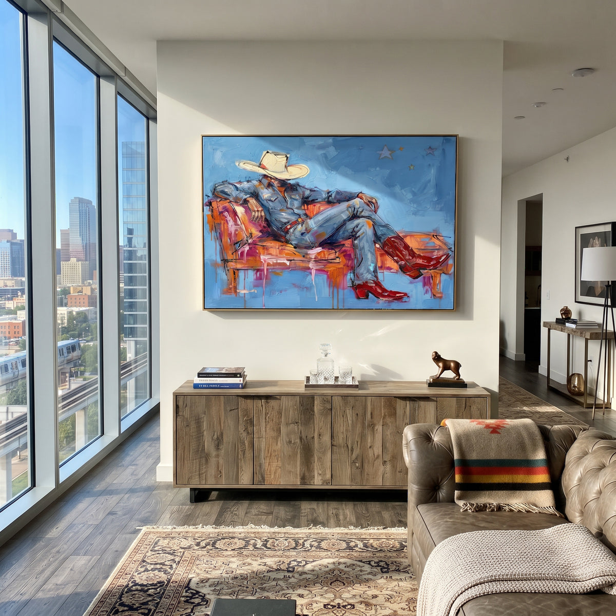 Cobalt Sofa, Scarlet Boots - reclining cowboy painting shown in modern room setting 4